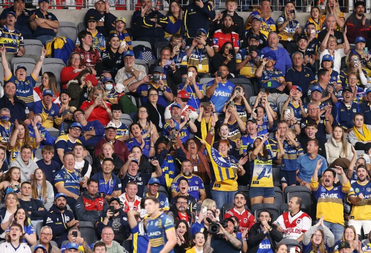 SYDNEY, AUSTRALIA - APRIL 03: Parramatta supporters cheer during the round four NRL match between the Parramatta Eels and the St George Illawarra Dragons at CommBank Stadium, on April 03, 2022, in Sydney, Australia. (Photo by Mark Kolbe/Getty Images)