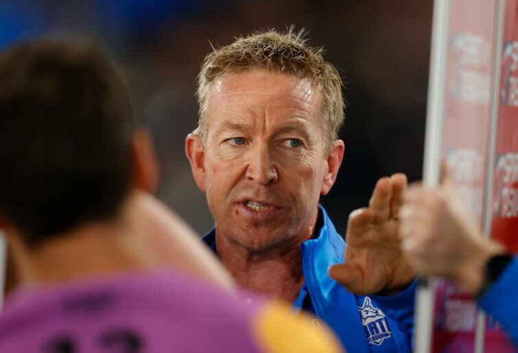 David Noble, Senior Coach of the Kangaroos addresses his players during the 2022 AFL Round 07 match between the Carlton Blues and the North Melbourne Kangaroos at Marvel Stadium on April 30, 2022 in Melbourne, Australia.  (Photo by Michael Willson/AFL Photos via Getty Images)
