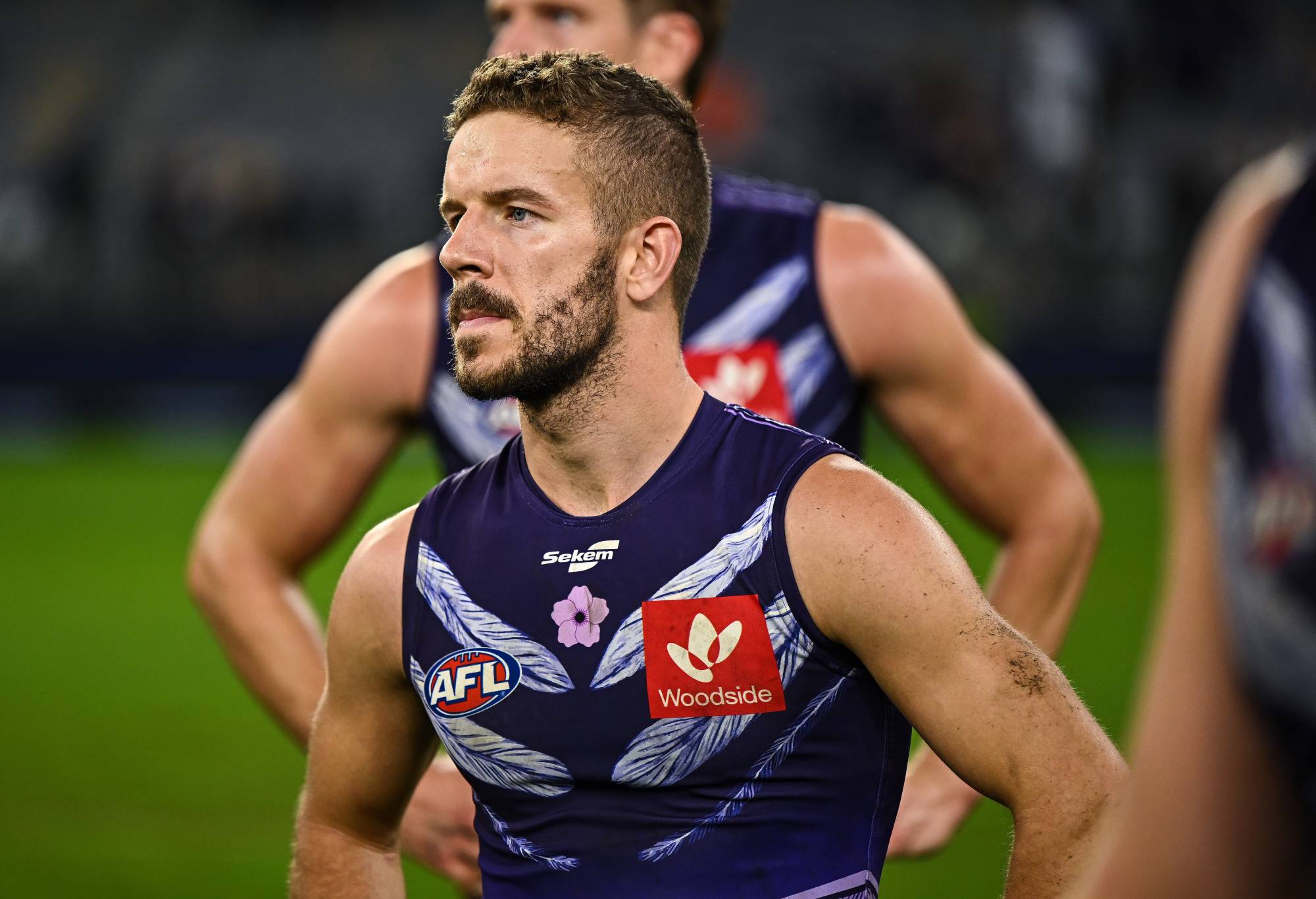 PERTH, AUSTRALIA - MAY 22: Sam Switkowski of the Dockers looks dejected after a loss during the 2022 AFL Round 10 match between the Fremantle Dockers and the Collingwood Magpies at Optus Stadium on May 22, 2022 in Perth, Australia. (Photo by Daniel Carson/AFL Photos via Getty Images)