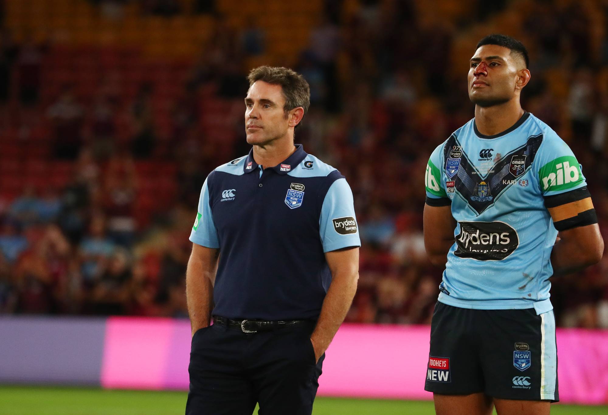 BRISBANE, AUSTRALIA - NOVEMBER 18: Blues coach Brad Fittler and Daniel Tupou look on after game three of the State of Origin series between the Queensland Maroons and the New South Wales Blues at Suncorp Stadium on November 18, 2020 in Brisbane, Australia. (Photo by Chris Hyde/Getty Images)
