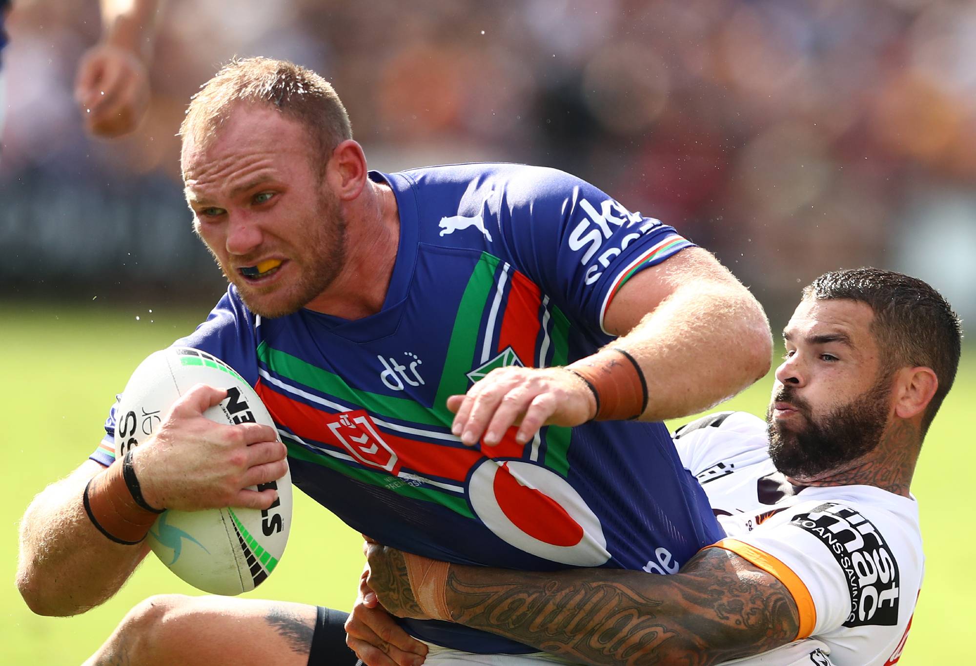 BRISBANE, AUSTRALIA - APRIL 02: Matthew Lodge of the Warriors is tackled during the round four NRL match between the New Zealand Warriors and the Brisbane Broncos at Moreton Daily Stadium, on April 02, 2022, in Brisbane, Australia. (Photo by Chris Hyde/Getty Images)