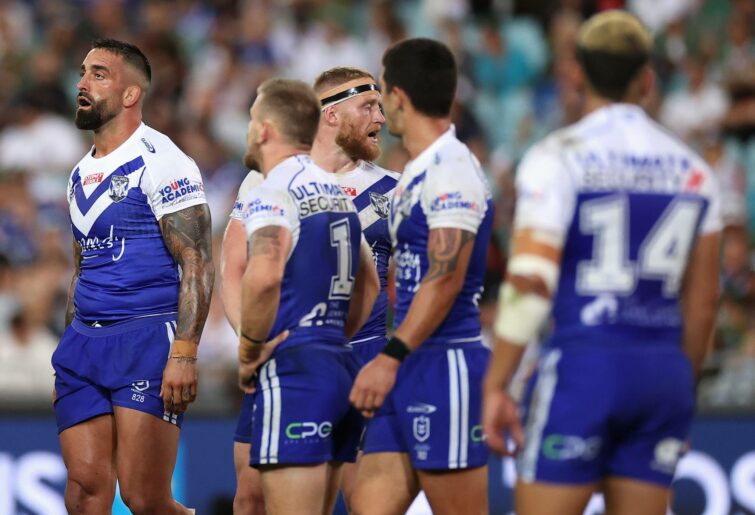 SYDNEY, AUSTRALIA - APRIL 15: Paul Vaughan of the Bulldogs and team mates look dejected during the round six NRL match between the South Sydney Rabbitohs and the Canterbury Bulldogs at Stadium Australia, on April 15, 2022, in Sydney, Australia. (Photo by Cameron Spencer/Getty Images)