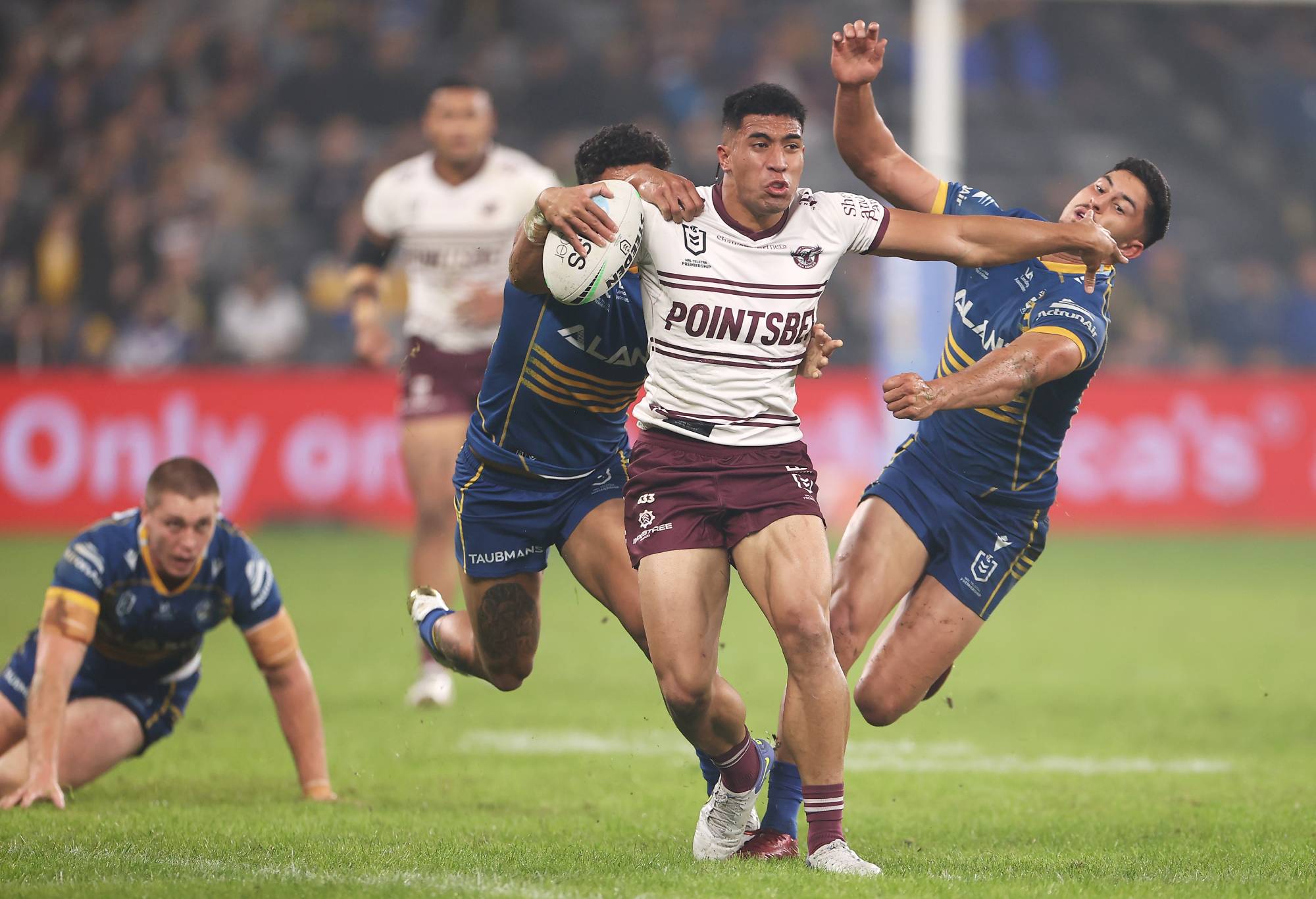 SYDNEY, AUSTRALIA - MAY 20: Tolutau Koula of the Sea Eagles is tackled during the round 11 NRL match between the Parramatta Eels and the Manly Sea Eagles at CommBank Stadium, on May 20, 2022, in Sydney, Australia. (Photo by Mark Kolbe/Getty Images)