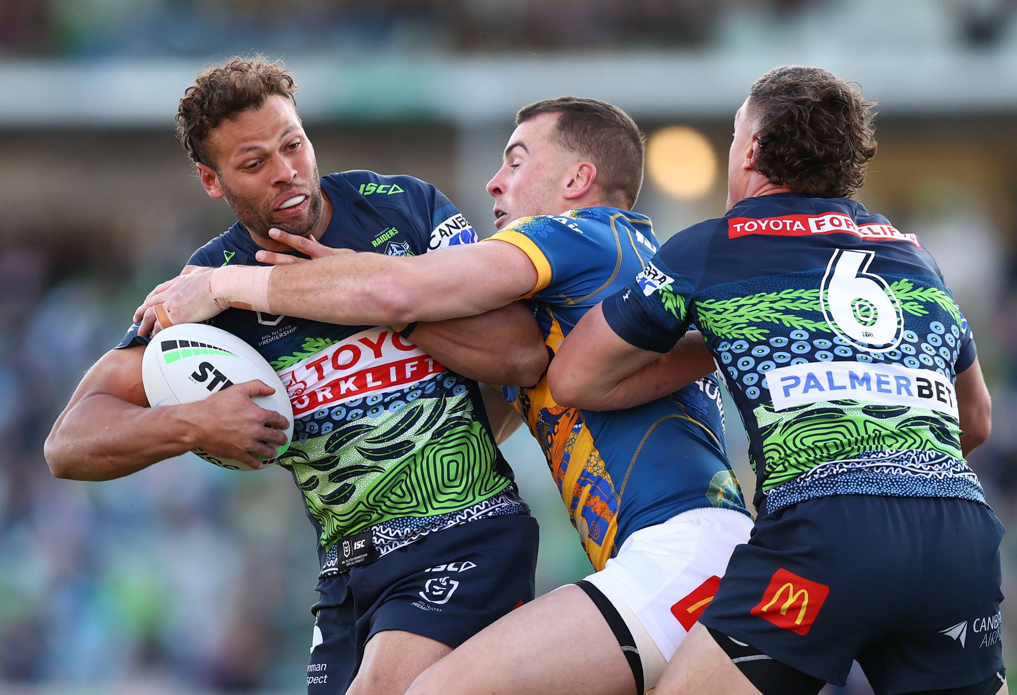 CANBERRA, AUSTRALIA - MAY 29: Sebastian Kris of the Raiders is tackled during the round 12 NRL match between the Canberra Raiders and the Parramatta Eels at GIO Stadium, on May 29, 2022, in Canberra, Australia. (Photo by Mark Nolan/Getty Images)