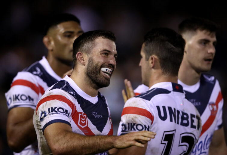 James Tedesco of the Roosters celebrates scoring a try.