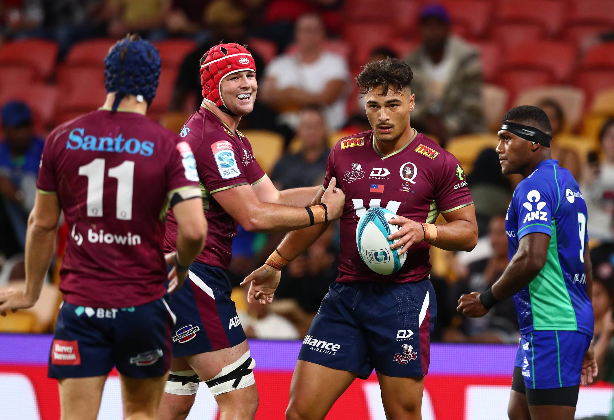 Jordan Petaia of the Reds celebrates a tryduring the round four Super Rugby Pacific match between the Queensland Reds and the Fijian Drua at Suncorp Stadium on March 12, 2022 in Brisbane, Australia. (Photo by Chris Hyde/Getty Images)