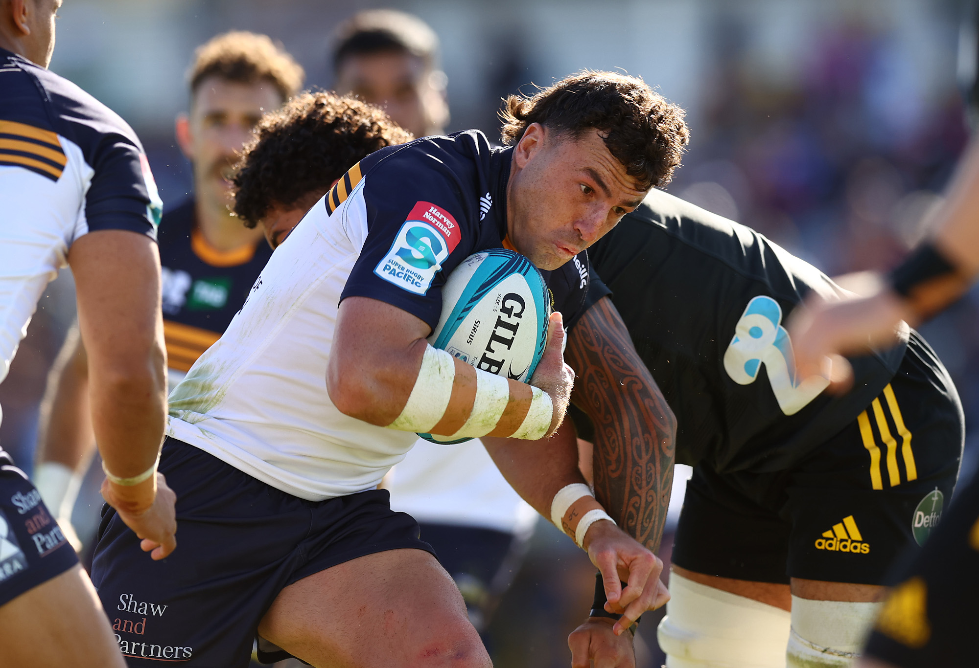 Tom Banks of the Brumbies in action.
