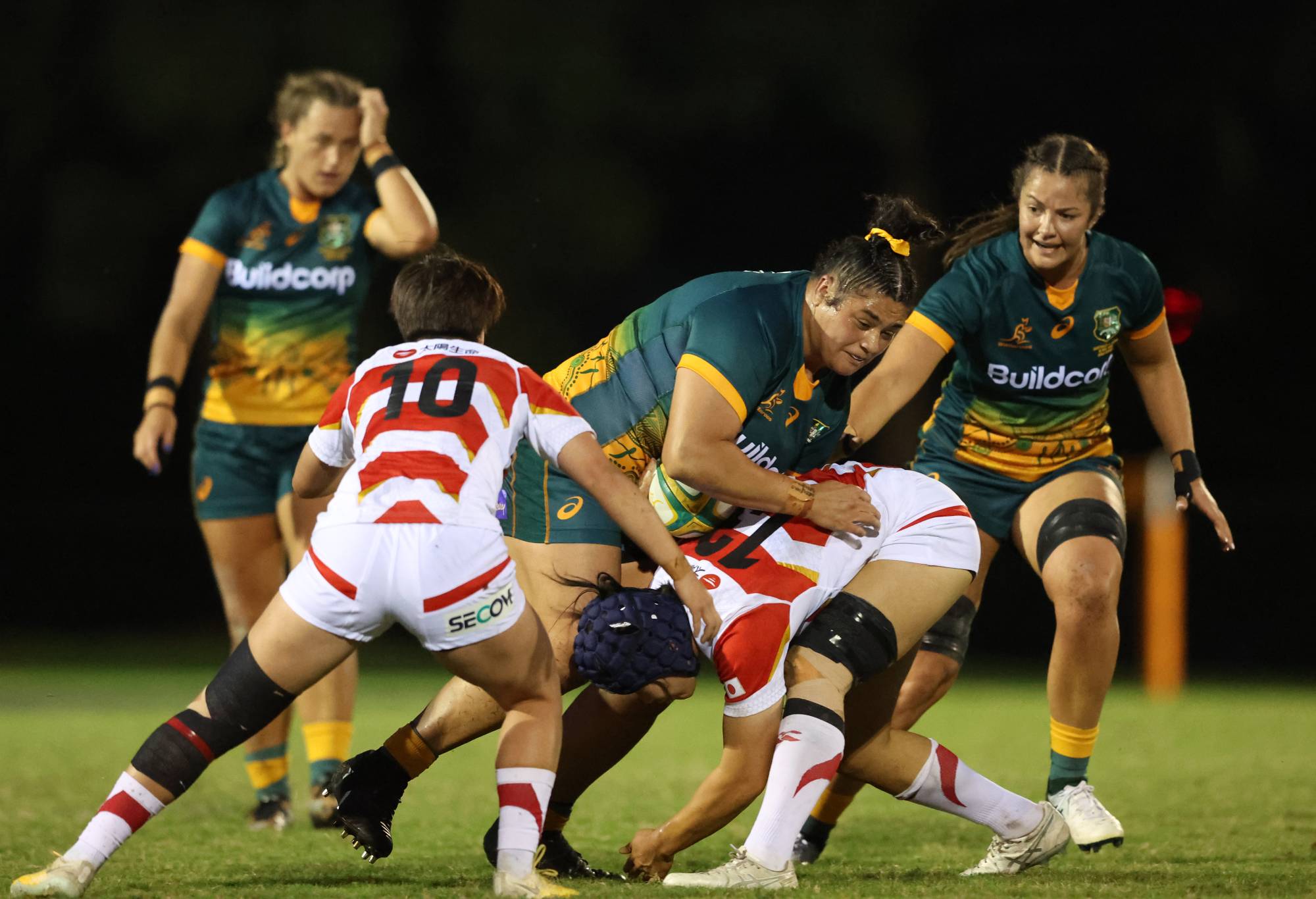 Asoiva Karpani of the Wallaroos is tackled during the Women's International Test match between the Australia Wallaroos and Japan at Bond University on May 10, 2022 in Gold Coast, Australia. (Photo by Chris Hyde/Getty Images)
