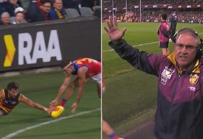 'Clearly out!' Lions done dirty by boundary umpire howler to allow Crows goal