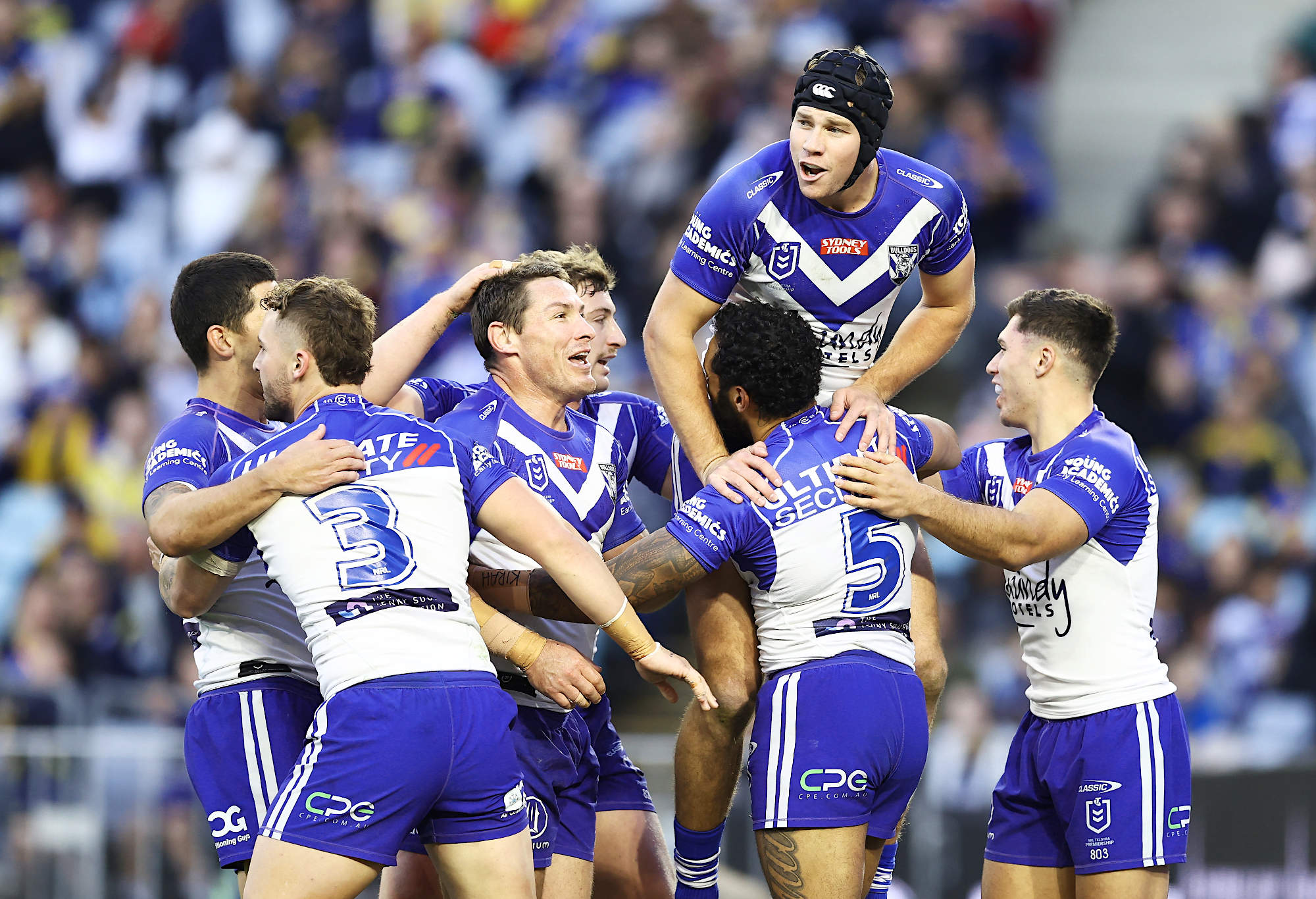 Canterbury Bulldogs players celebrate a try