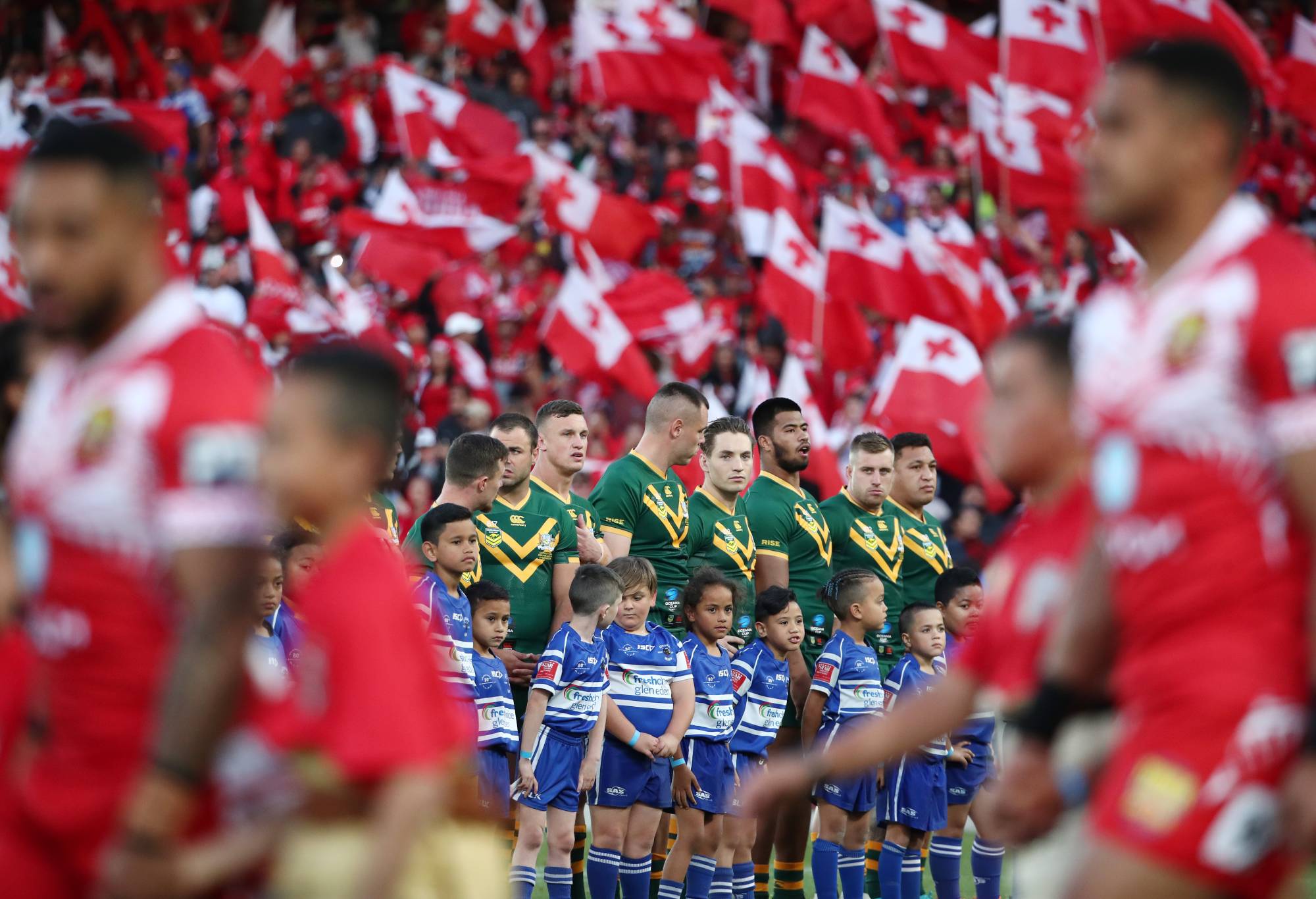 AUCKLAND, NEW ZEALAND - NOVEMBER 02: The Kangaroos line up for the national anthems during the Rugby League International Test match between the Australia Kangaroos and Tonga at Eden Park on November 02, 2019 in Auckland, New Zealand. (Photo by Fiona Goodall/Getty Images)