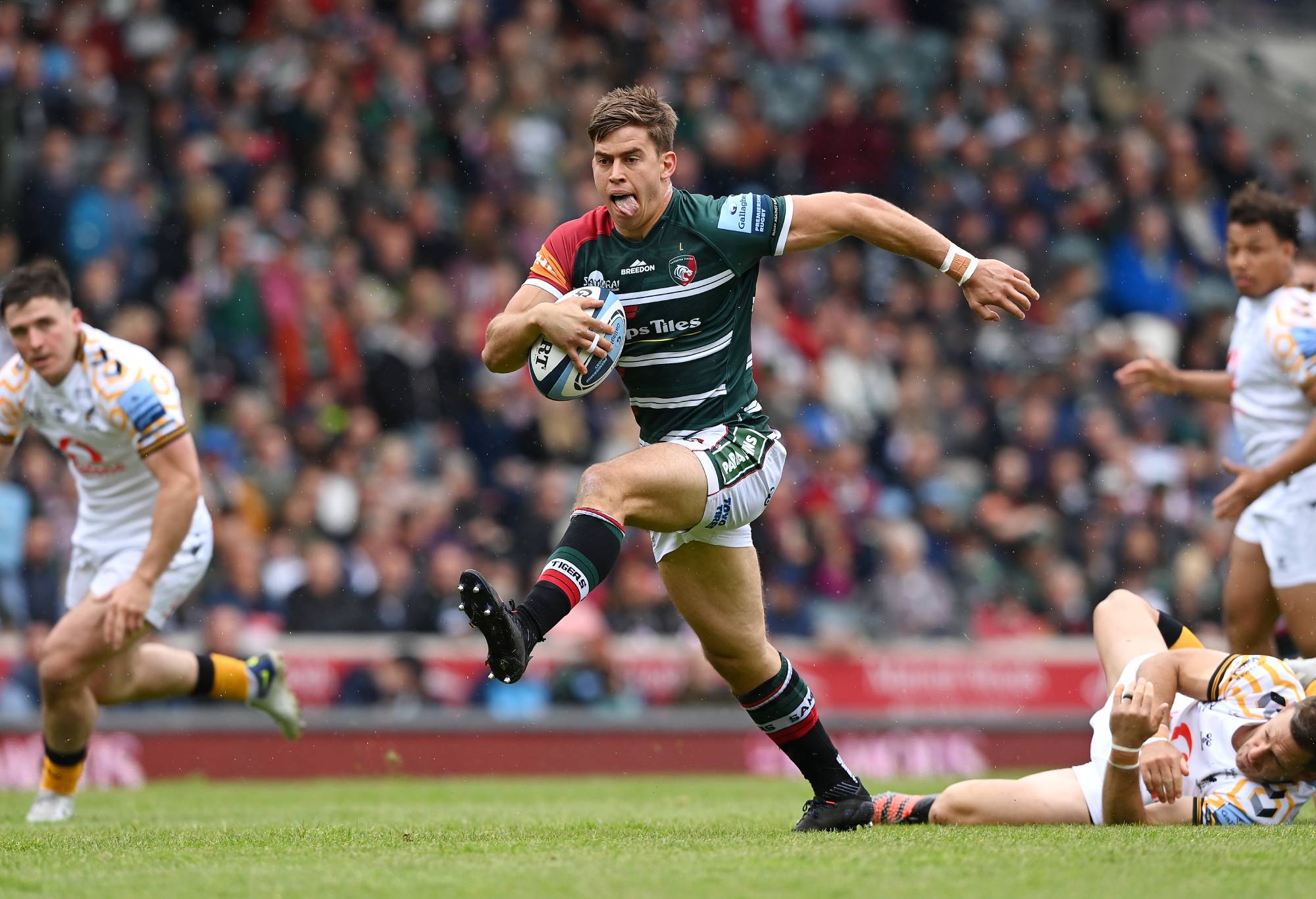 Guy Porter of Leicester Tigers makes a break to score their sides first try during the Gallagher Premiership Rugby match between Leicester Tigers and Wasps at Mattioli Woods Welford Road Stadium on June 04, 2022 in Leicester, England. (Photo by Alex Davidson/Getty Images)