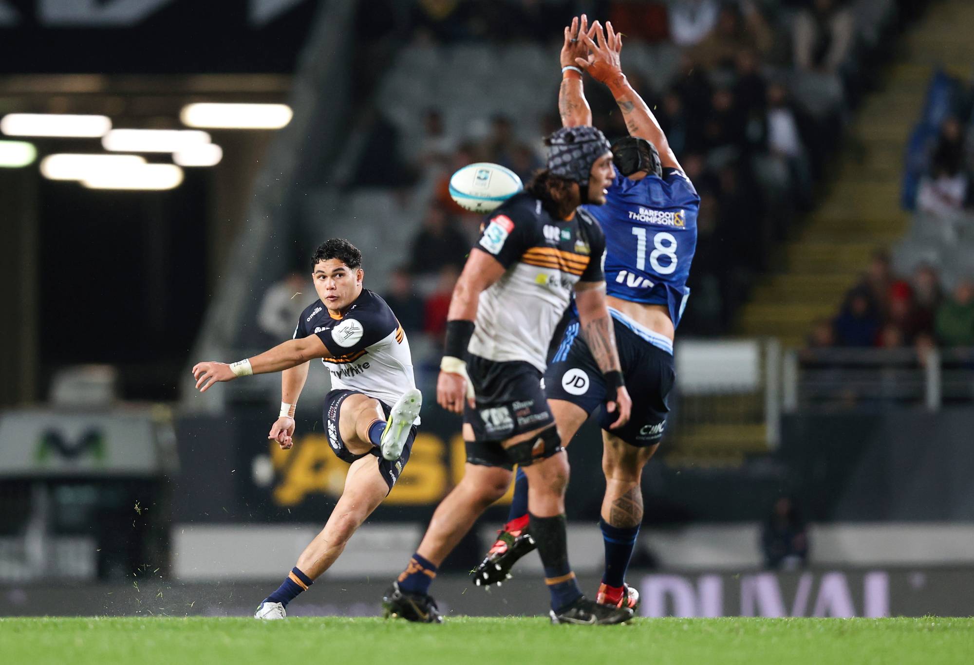 Noah Lolesio of the Brumbies has his attempt at a drop goal charged down by Ofa Tuungafasi of the Blues during the Super Rugby Pacific Semi Final match between the Blues and the Brumbies at Eden Park on June 11, 2022 in Auckland, New Zealand. (Photo by Phil Walter/Getty Images)