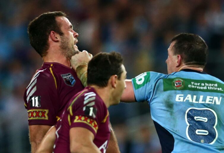 Paul Gallen of the Blues punches Nate Myles of the Maroons during game one of the ARL State of Origin series between the New South Wales Blues and the Queensland Maroons at ANZ Stadium on June 5, 2013 in Sydney, Australia. (Photo by Mark Kolbe/Getty Images)