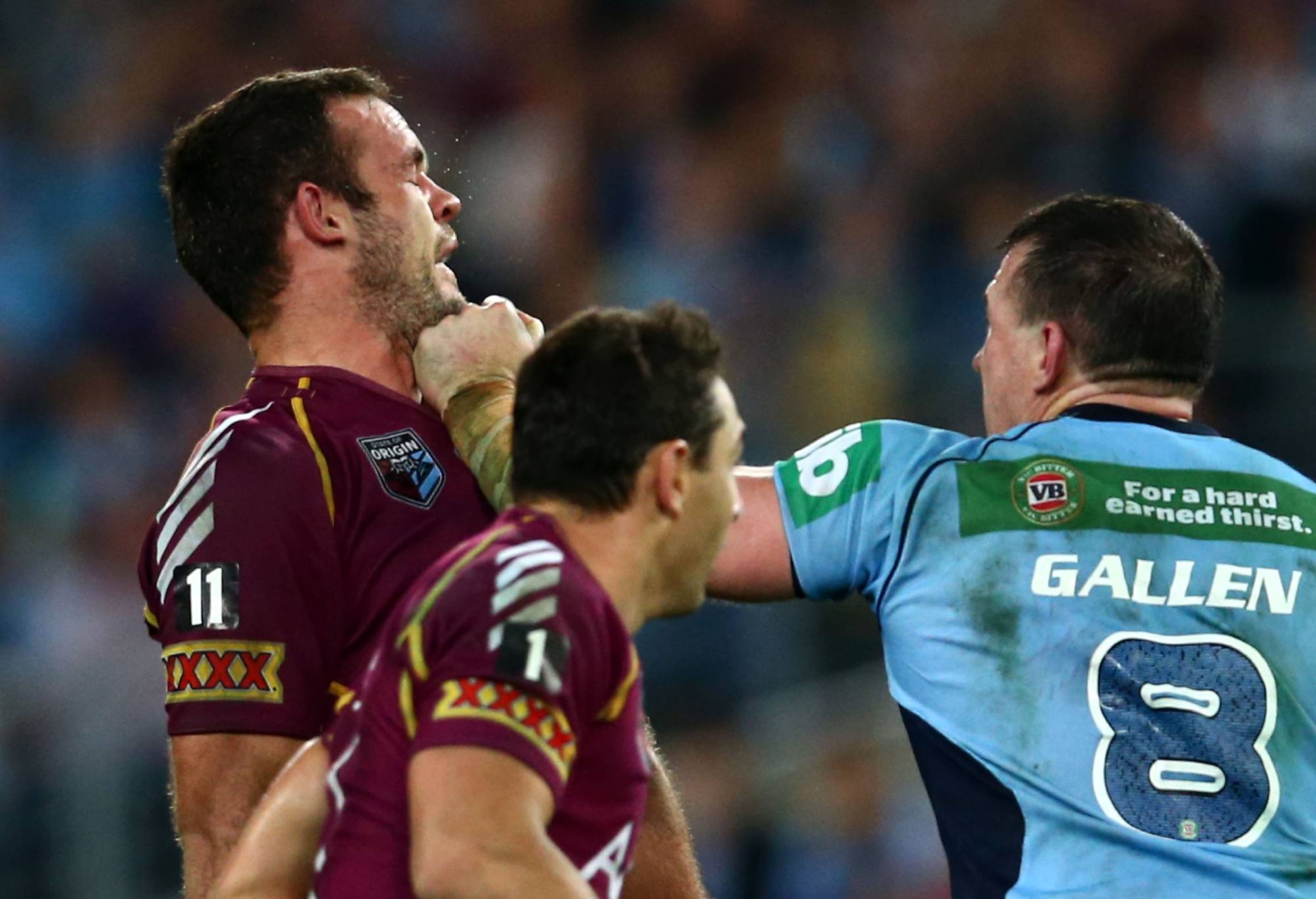 Paul Gallen of the Blues punches Nate Myles of the Maroons during game one of the ARL State of Origin series between the New South Wales Blues and the Queensland Maroons at ANZ Stadium on June 5, 2013 in Sydney, Australia. (Photo by Mark Kolbe/Getty Images)