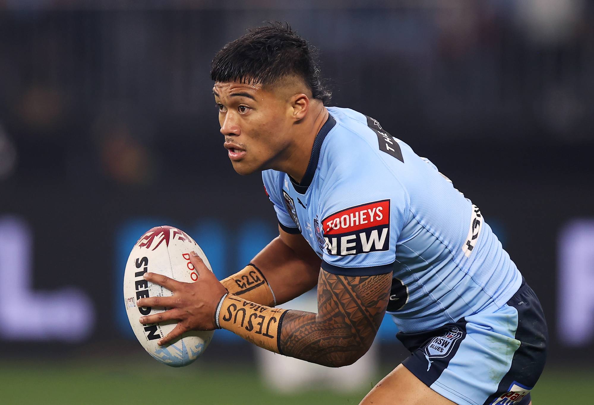Brian To'o runs the ball for NSW