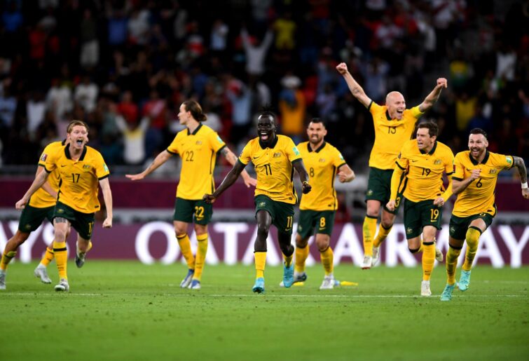 Australia celebrate after defeating Peru in the 2022 FIFA World Cup Playoff match