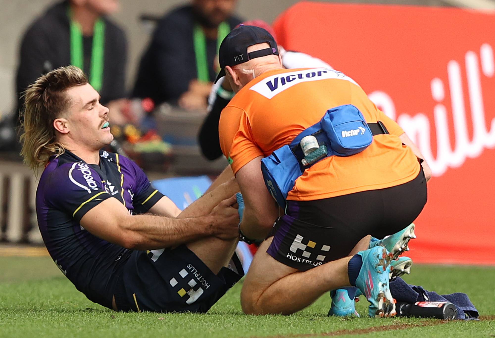 MELBOURNE, AUSTRALIA - MAY 08: Ryan Papenhuyzen of the Storm is checked for a possible injury during the round nine NRL match between the Melbourne Storm and the St George Illawarra Dragons at AAMI Park, on May 08, 2022, in Melbourne, Australia. (Photo by Robert Cianflone/Getty Images)