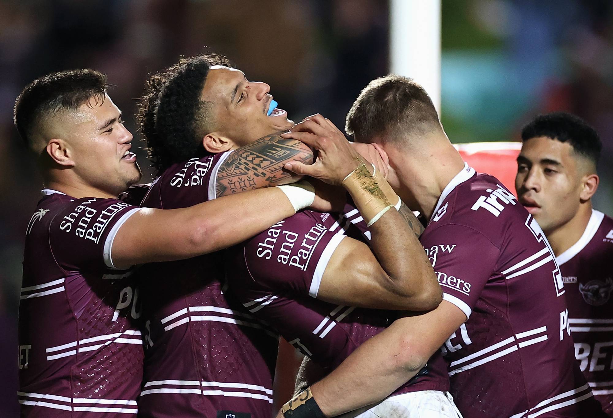 SYDNEY, AUSTRALIA - JUNE 04: Jason Saab of the Sea Eagles celebrates scoring a try with team mates during the round 13 NRL match between the Manly Sea Eagles and the New Zealand Warriors at 4 Pines Park, on June 04, 2022, in Sydney, Australia. (Photo by Cameron Spencer/Getty Images)