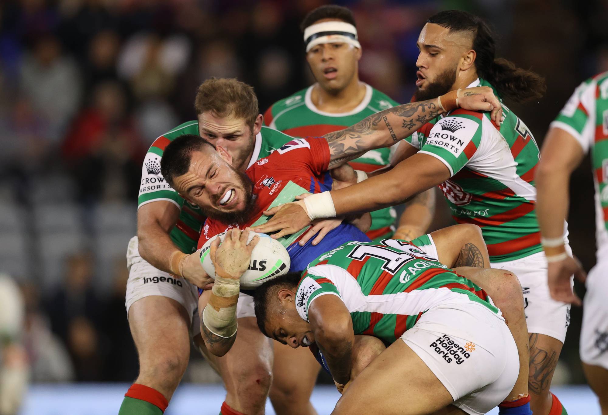 NEWCASTLE, AUSTRALIA - JULY 08: David Klemmer of the Knights is tackled during the round 17 NRL match between the Newcastle Knights and the South Sydney Rabbitohs at McDonald Jones Stadium, on July 08, 2022, in Newcastle, Australia. (Photo by Ashley Feder/Getty Images)