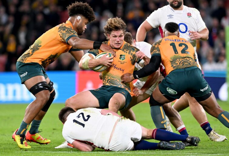 Michael Hooper of the Wallabies is tackled during game two of the International Test Match series between the Australia Wallabies and England at Suncorp Stadium on July 09, 2022 in Brisbane, Australia. (Photo by Bradley Kanaris - The RFU/The RFU Collection via Getty Images)