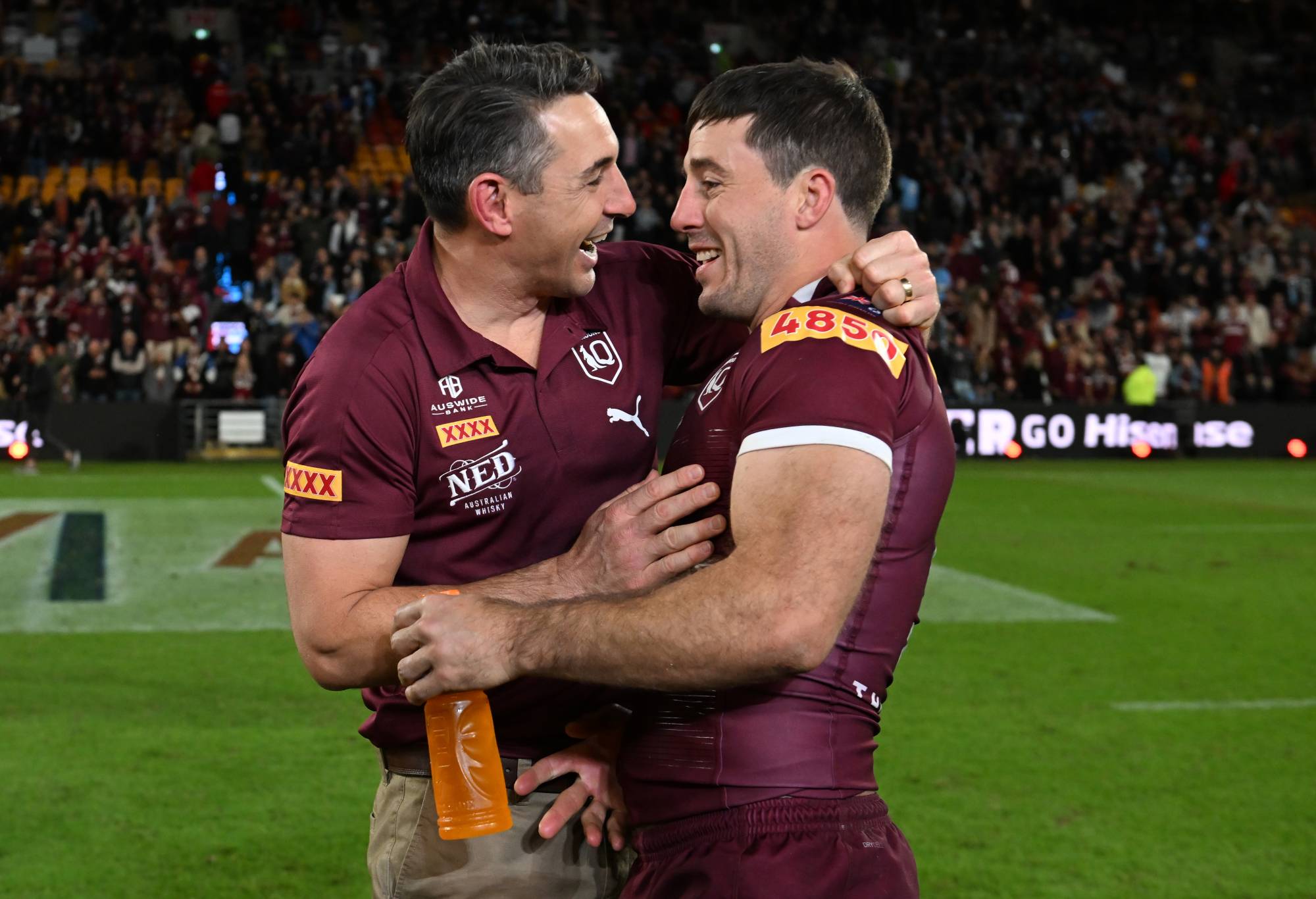 BRISBANE, AUSTRALIA - JULY 13: Billy Slater head coach of the Maroons and Ben Hunt of the Maroons celebrate victory during game three of the State of Origin Series between the Queensland Maroons and the New South Wales Blues at Suncorp Stadium on July 13, 2022 in Brisbane, Australia. (Photo by Bradley Kanaris/Getty Images)