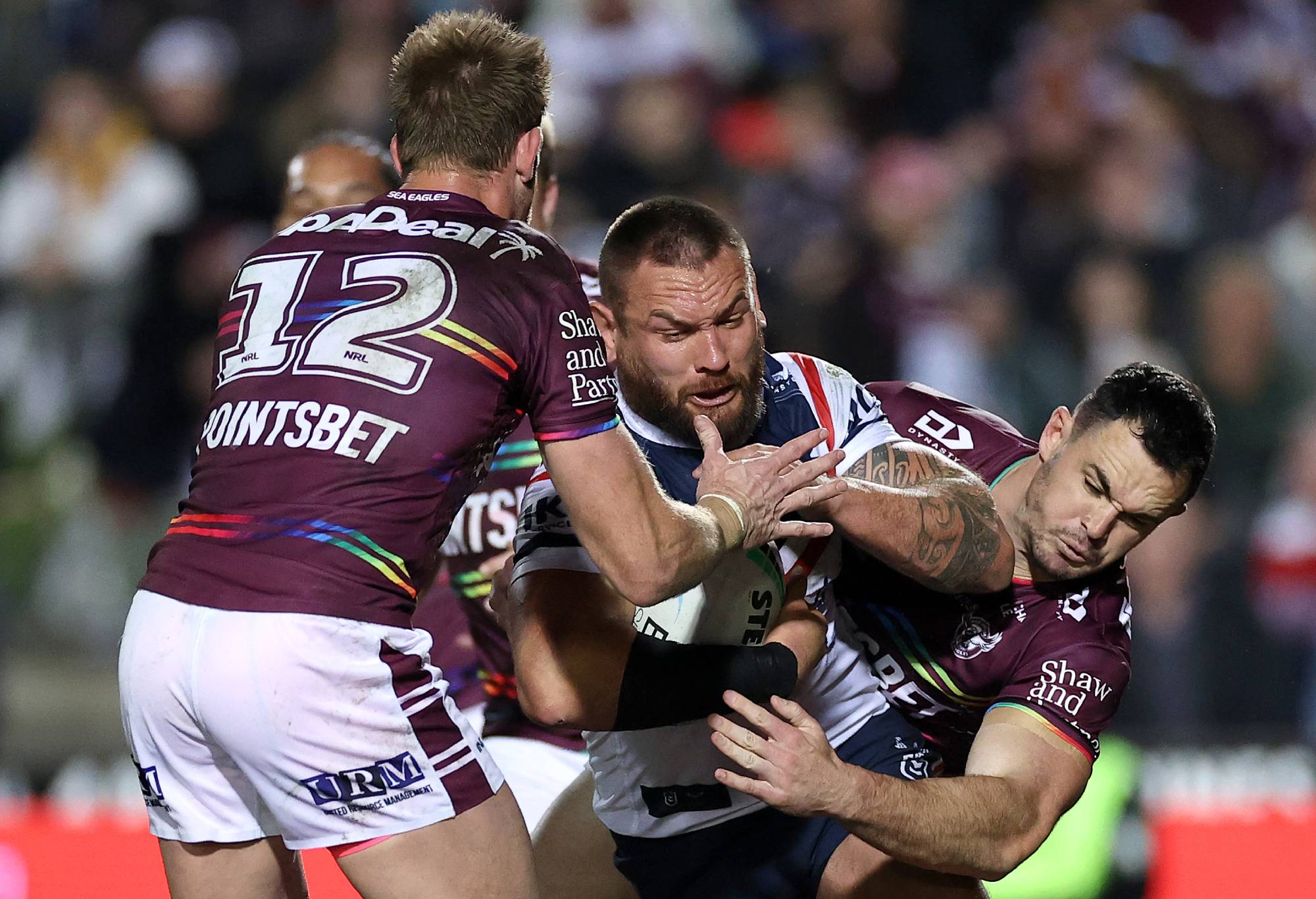 SYDNEY, AUSTRALIA - JULY 28: Jared Waerea-Hargreaves of the Roosters is tackled during the round 20 NRL match between the Manly Sea Eagles and the Sydney Roosters at 4 Pines Park on July 28, 2022, in Sydney, Australia. (Photo by Cameron Spencer/Getty Images)