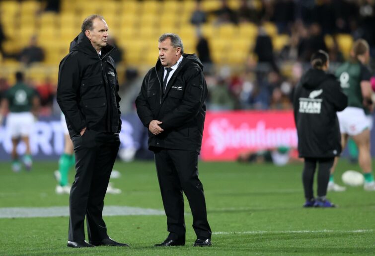 All Blacks head coach Ian Foster (R) and John Plumtree (L) watch warm up during the International Test match between the New Zealand All Blacks and Ireland at Sky Stadium on July 16, 2022 in Wellington, New Zealand. (Photo by Phil Walter/Getty Images)