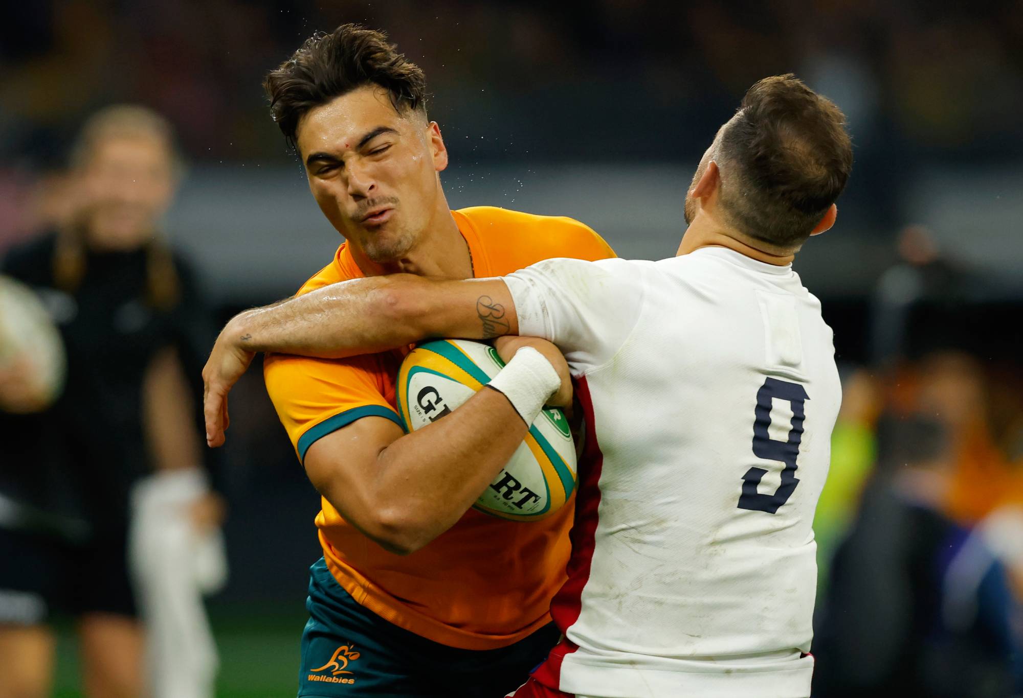 Jordan Petaia of the Wallabies attempts to break the tackle from Danny Care of England during game one of the international test match series between the Australian Wallabies and England at Optus Stadium on July 02, 2022 in Perth, Australia. (Photo by James Worsfold/Getty Images)