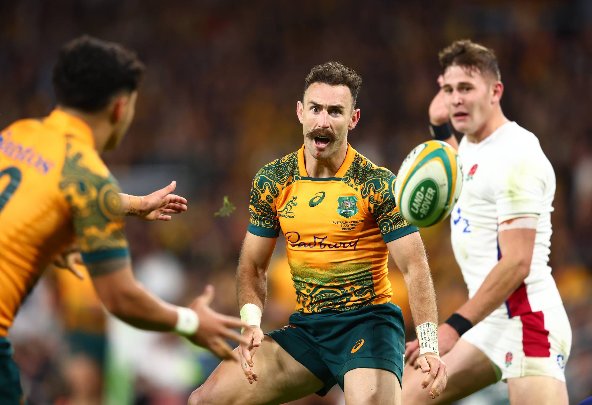Nic White of the Wallabies passes during game two of the International Test Match series between the Australia Wallabies and England at Suncorp Stadium on July 09, 2022 in Brisbane, Australia. (Photo by Chris Hyde/Getty Images)