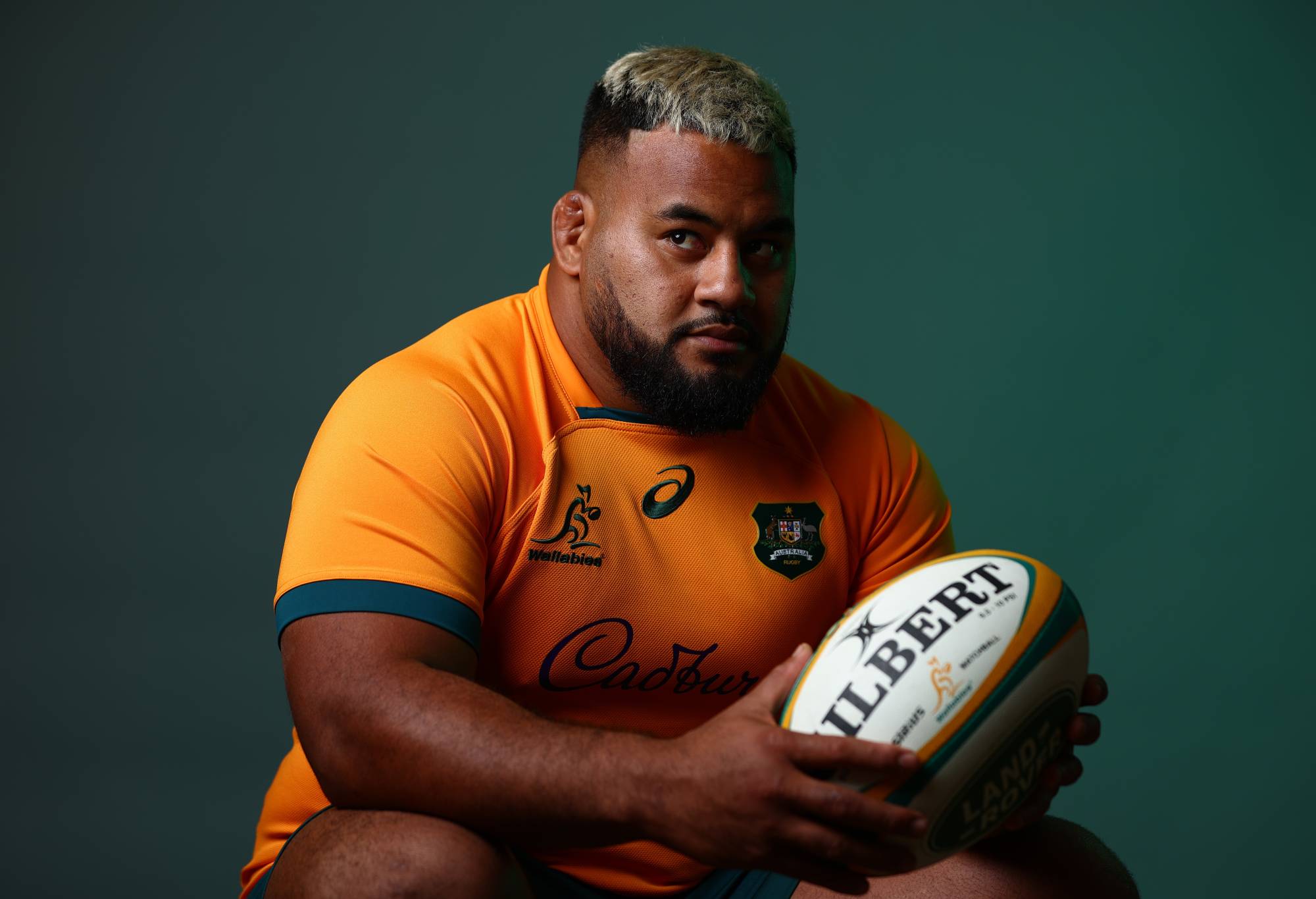 Taniela Tupou poses during the Australian Wallabies 2022 Team Headshots session on June 24, 2022 in Sunshine Coast, Australia. (Photo by Chris Hyde/Getty Images for Rugby Australia)