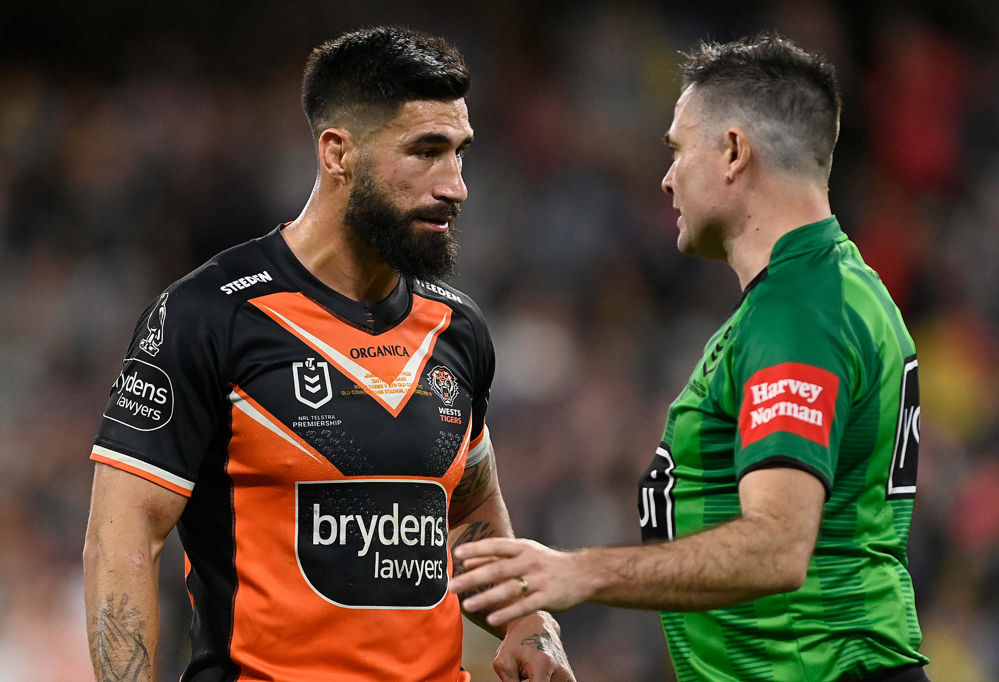 James Tamou of the Tigers speaks with the referee