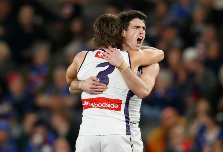 Caleb Serong and Andrew Brayshaw of the Dockers celebrate.