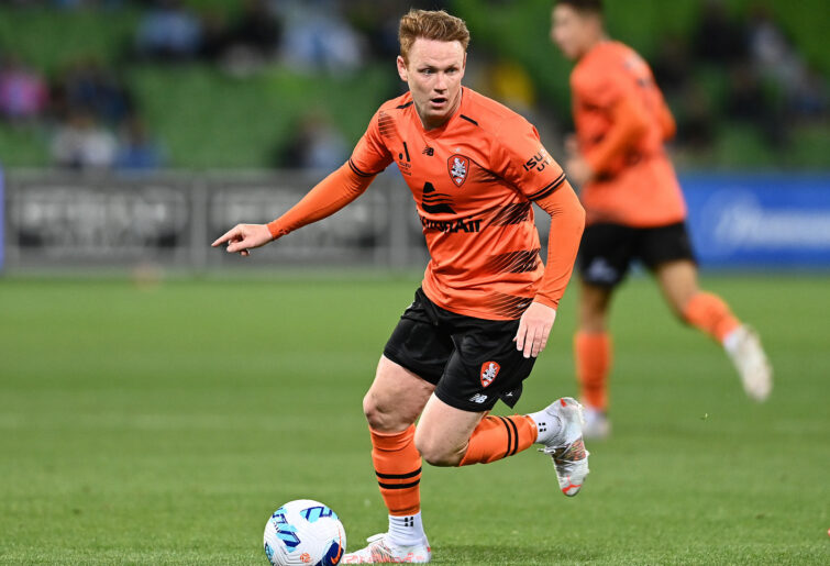 Corey Brown of Brisbane Roar looks to pass the ball.