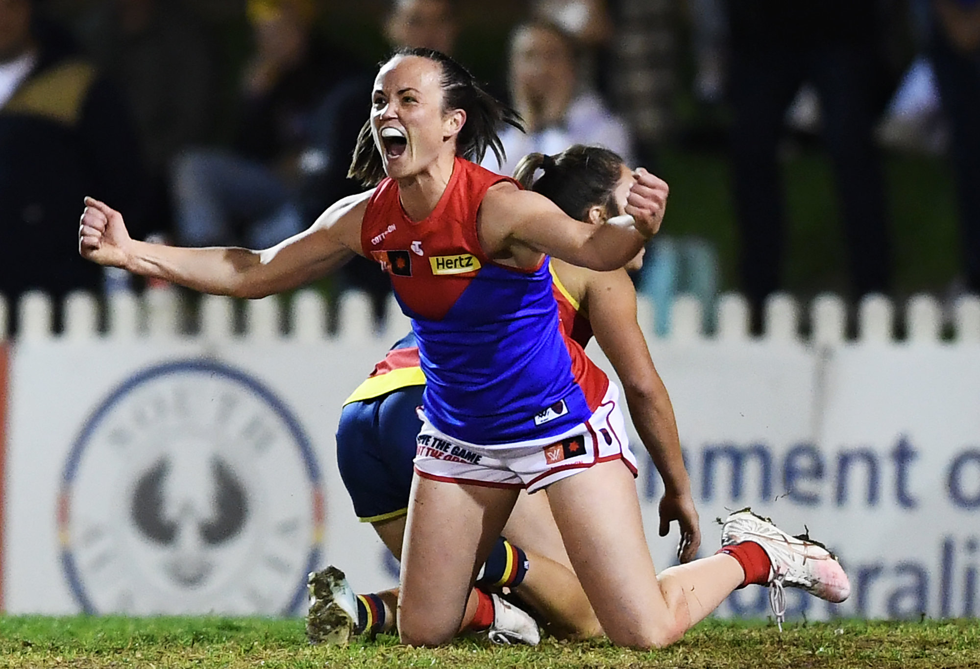 Daisy Pearce of the Demons celebrates a goal.