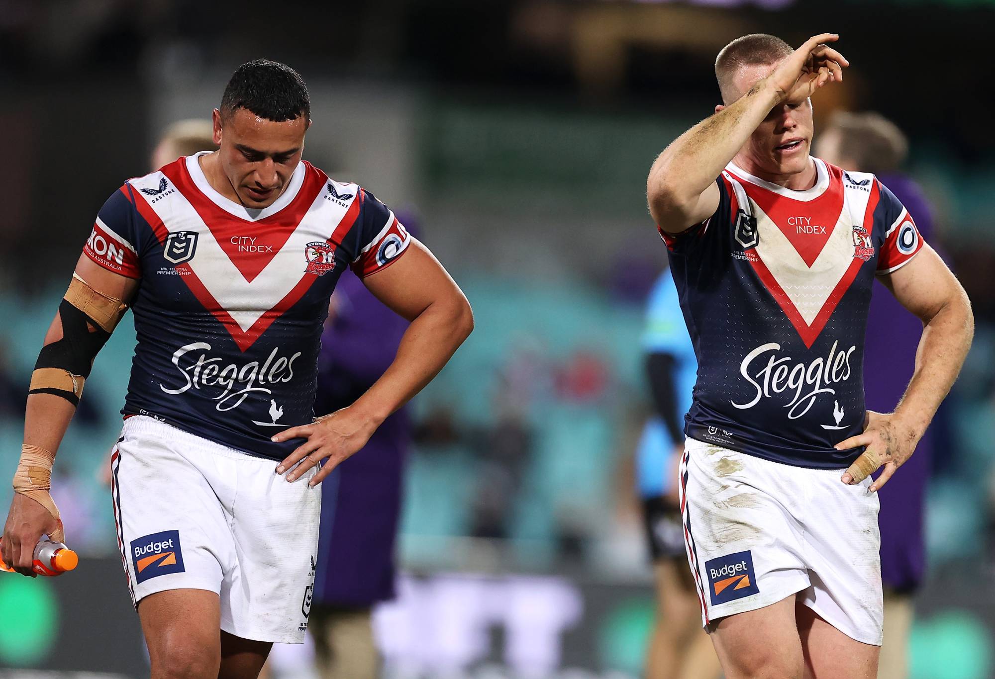 SYDNEY, AUSTRALIA - JUNE 11: Siosiua Taukeiaho and Lindsay Collins of the Roosters look dejected after defeat during the round 14 NRL match between the Sydney Roosters and the Melbourne Storm at Sydney Cricket Ground, on June 11, 2022, in Sydney, Australia. (Photo by Mark Kolbe/Getty Images)