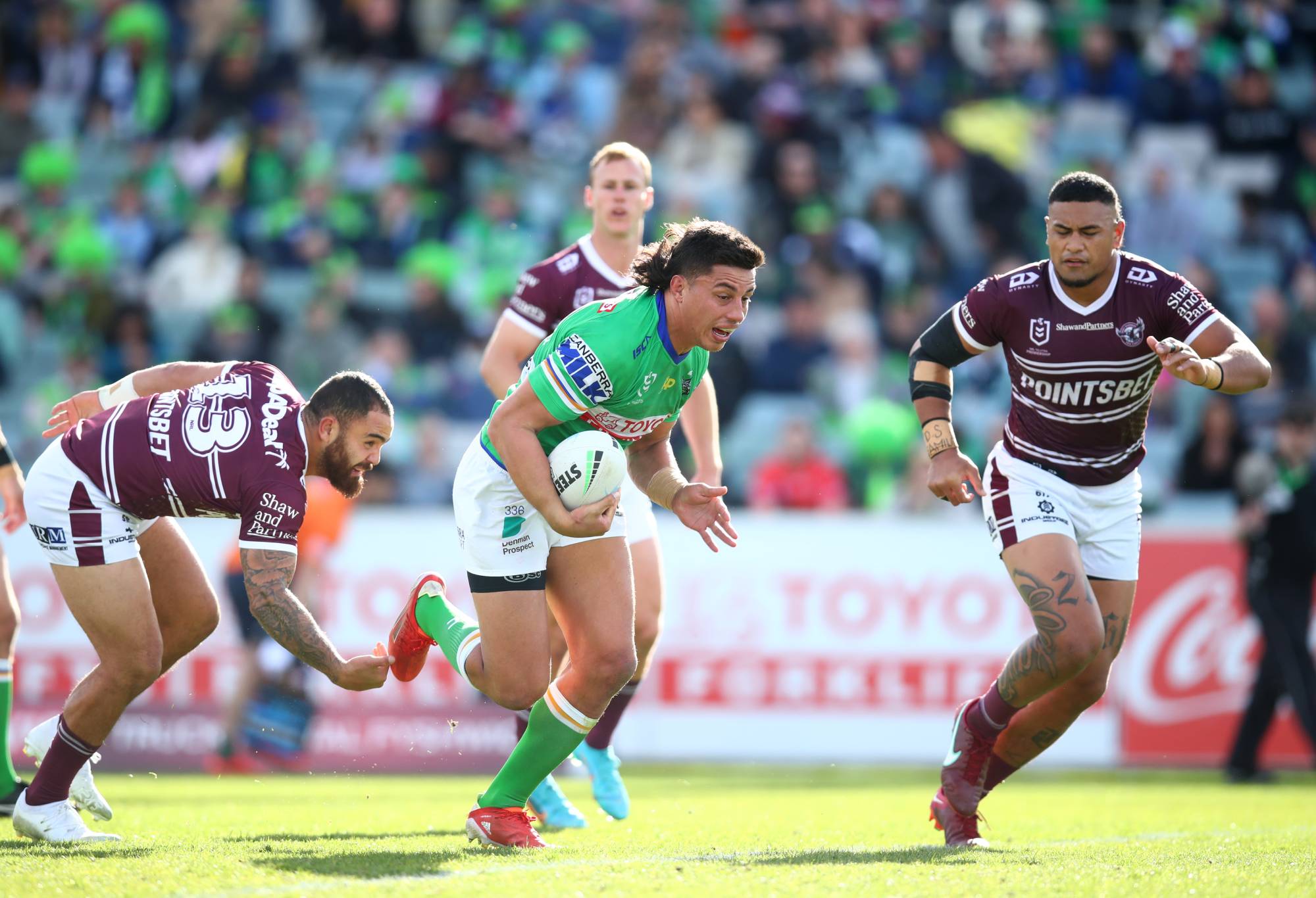 CANBERRA, AUSTRALIA - AUGUST 27: Joseph Tapine of the Raiders makes a break during the round 24 NRL match between the Canberra Raiders and the Manly Sea Eagles at GIO Stadium on August 27, 2022 in Canberra, Australia. (Photo by Jason McCawley/Getty Images)