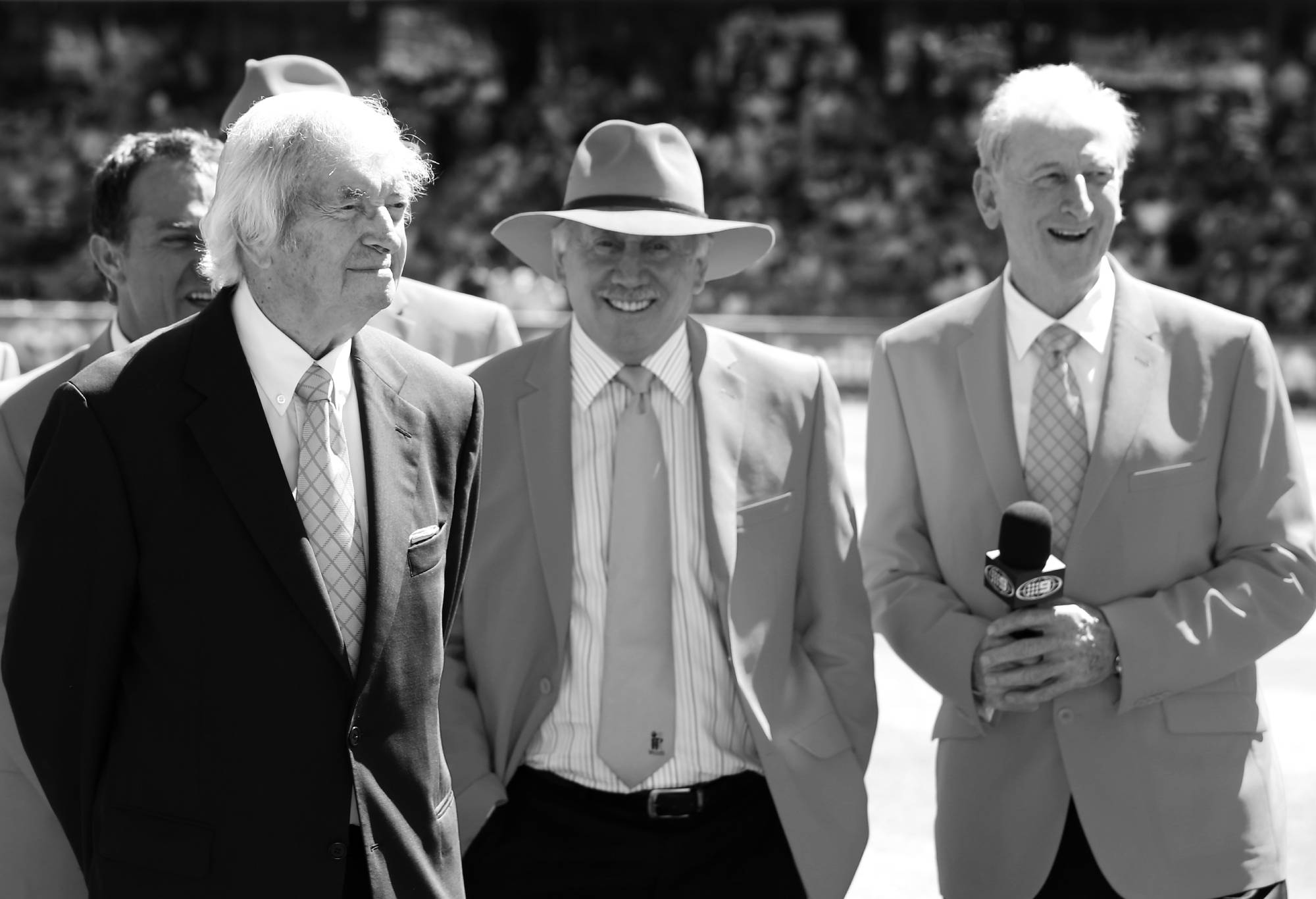 SYDNEY, AUSTRALIA - JANUARY 05:  (EDITORS NOTE: Image has been converted to black and white.) Former Australian test players and current Channel 9 commentators Ian Healy, Richie Benaud, Michael Slater, Ian Chappell and Bill Lawry watch on during a McGrath Foundation piece at the tea break during day three of the Third Test match between Australia and Sri Lanka at Sydney Cricket Ground on January 5, 2013 in Sydney, Australia.  (Photo by Mark Kolbe/Getty Images)