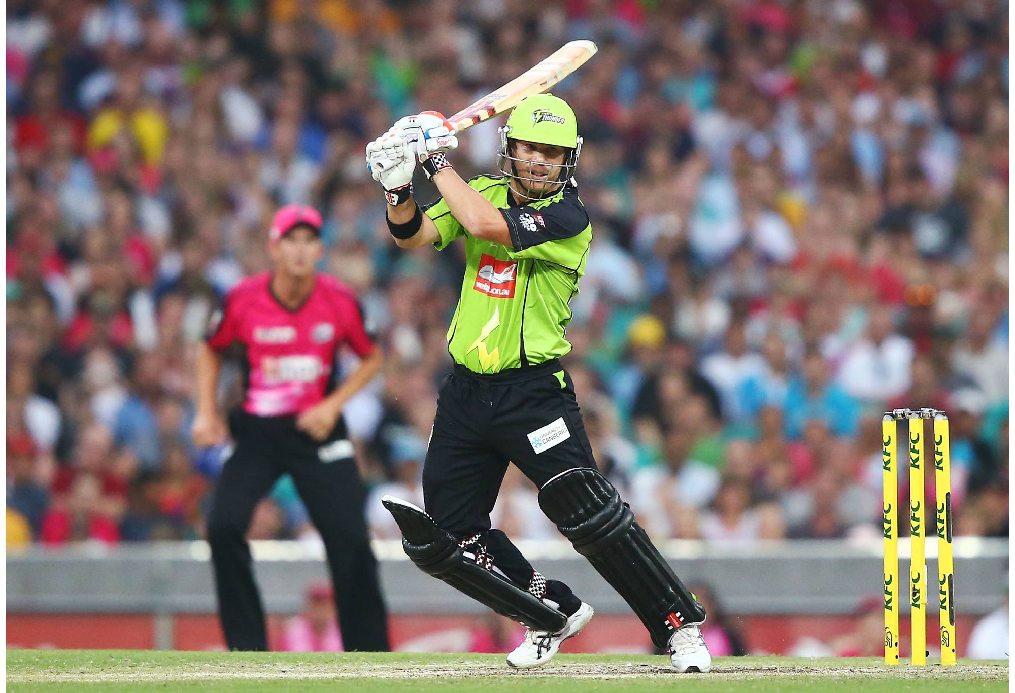 SYDNEY, AUSTRALIA - DECEMBER 21: David Warner of the Thunder plays a cut shot during the Big Bash League match between the Sydney Sixers and Sydney Thunder at SCG on December 21, 2013 in Sydney, Australia. (Photo by Matt King/Getty Images)