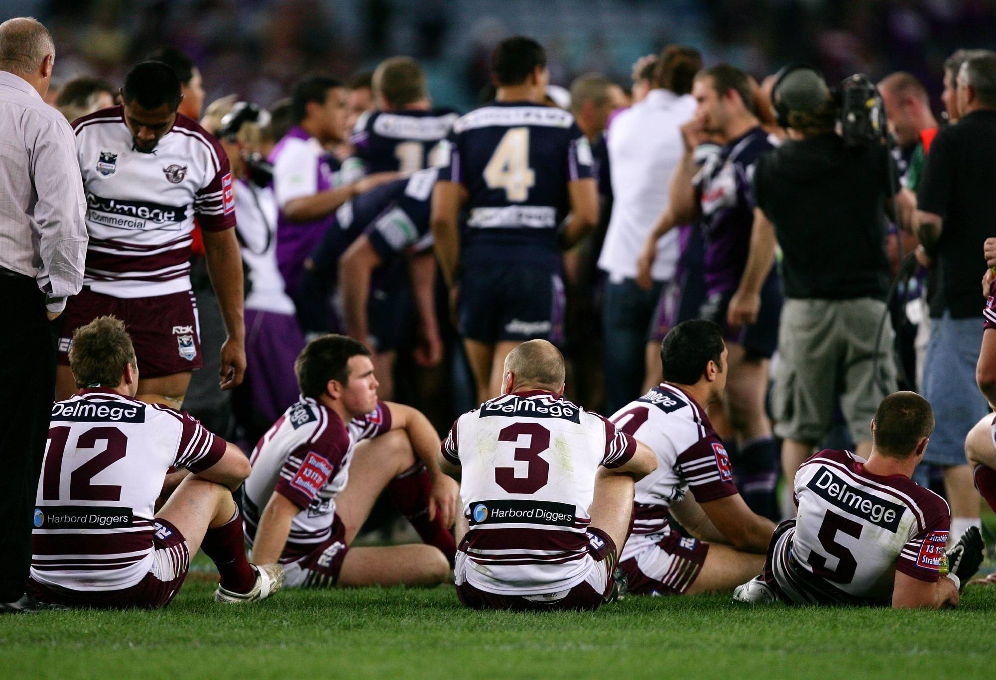 SYDNEY, AUSTRALIA - SEPTEMBER 30:  Sea Eagles players look dejected after the NRL Grand Final match between the Melbourne Storm and the Manly Warringah Sea Eagles at Telstra Stadium September 30, 2007 in Sydney, Australia.  (Photo by Matt King/Getty Images)