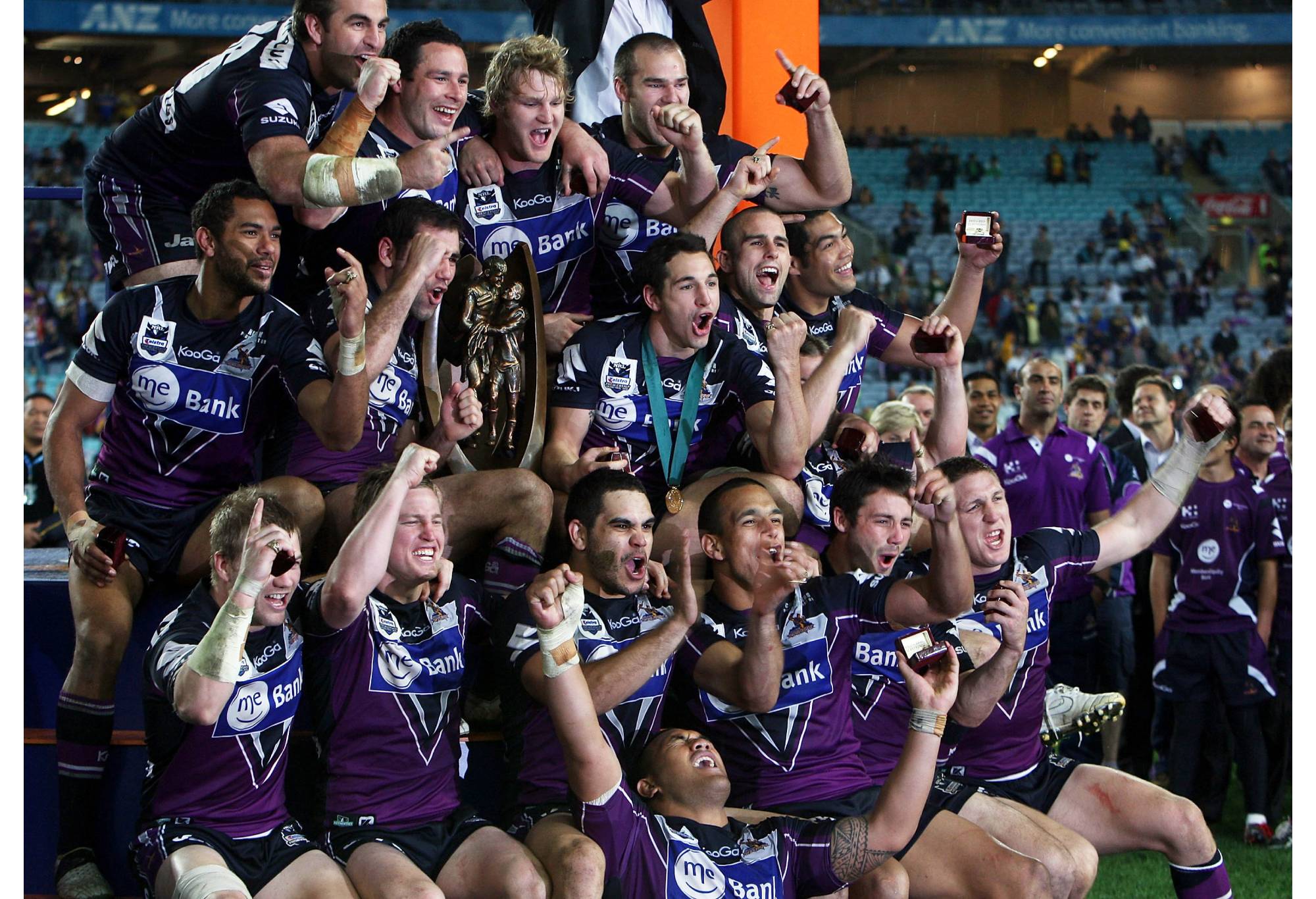 SYDNEY, AUSTRALIA - OCTOBER 04:  The Melbourne Storm team celebrate with the trophy after winning the 2009 NRL Grand Final match between the Parramatta Eels and the Melbourne Storm at ANZ Stadium on October 4, 2009 in Sydney, Australia.  (Photo by Mark Kolbe/Getty Images)