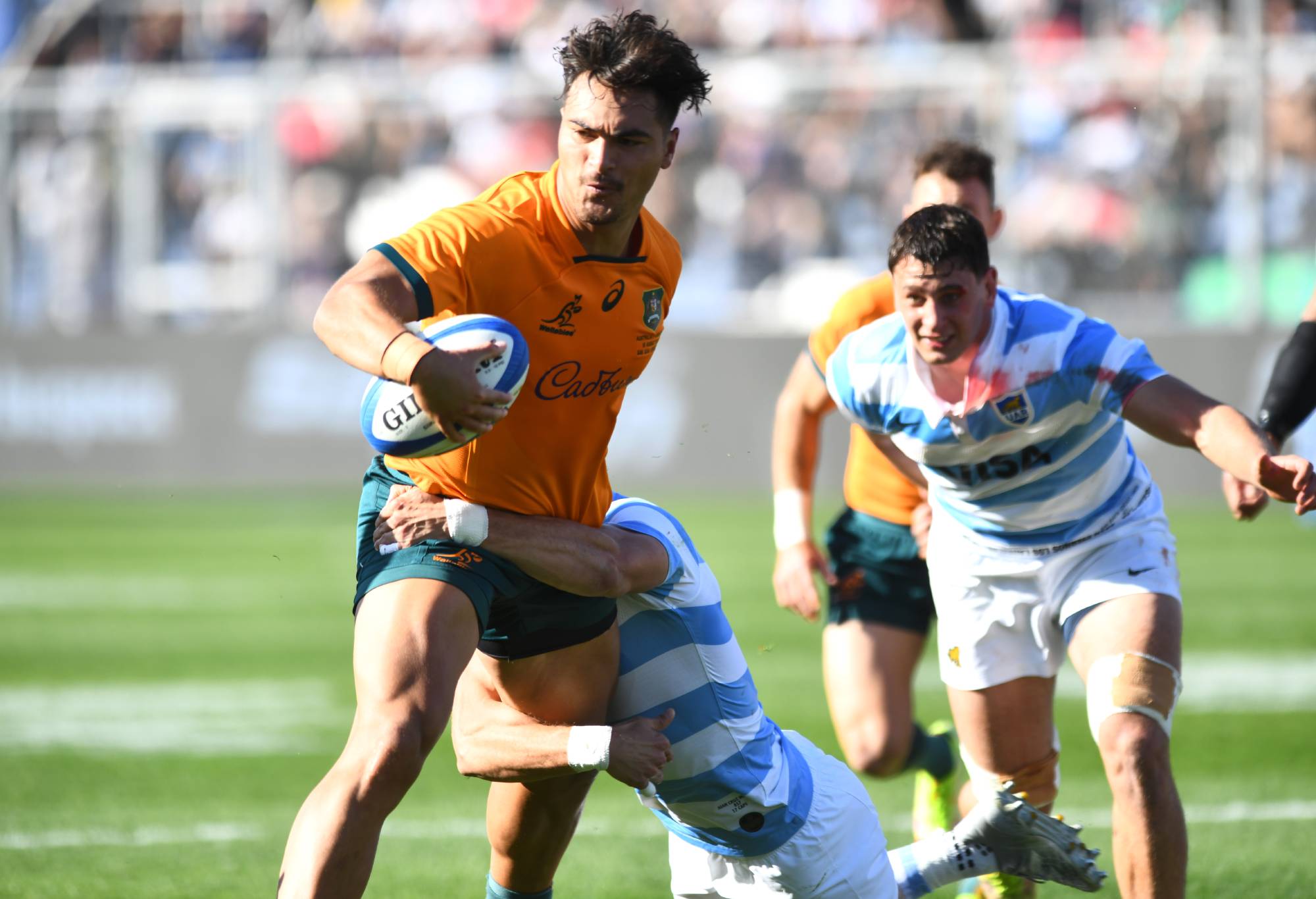 Jordan Petaia of Australia attempts to avoid a tackle during a Rugby Championship match between Argentina Pumas and Australian Wallabies at San Juan del Bicentenario Stadium on August 13, 2022 in San Juan, Argentina. (Photo by Rodrigo Valle/Getty Images)