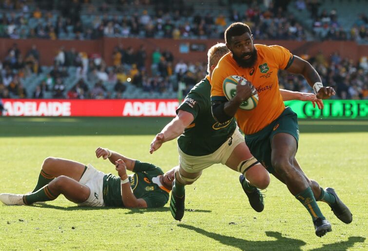 Marika Koroibete of the Wallabies makes a break to score a try during The Rugby Championship match between the Australian Wallabies and the South African Springboks at Adelaide Oval on August 27, 2022 in Adelaide, Australia. (Photo by Mark Kolbe/Getty Images)