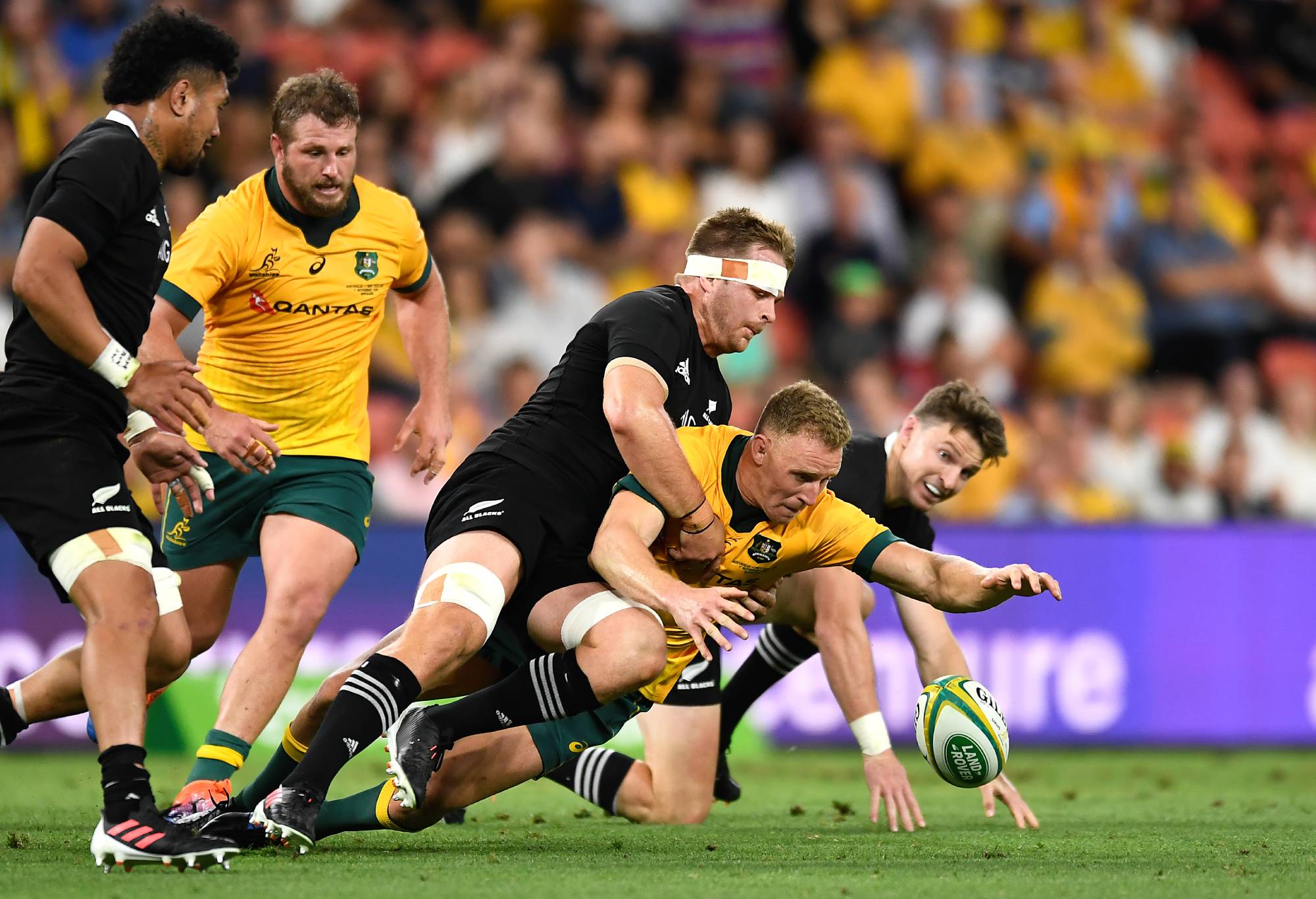 Reece Hodge of the Wallabies drops the ball while tackled during the 2020 Tri-Nations match between the Australian Wallabies and the New Zealand All Blacks at Suncorp Stadium on November 07, 2020 in Brisbane, Australia. (Photo by Albert Perez/Getty Images)