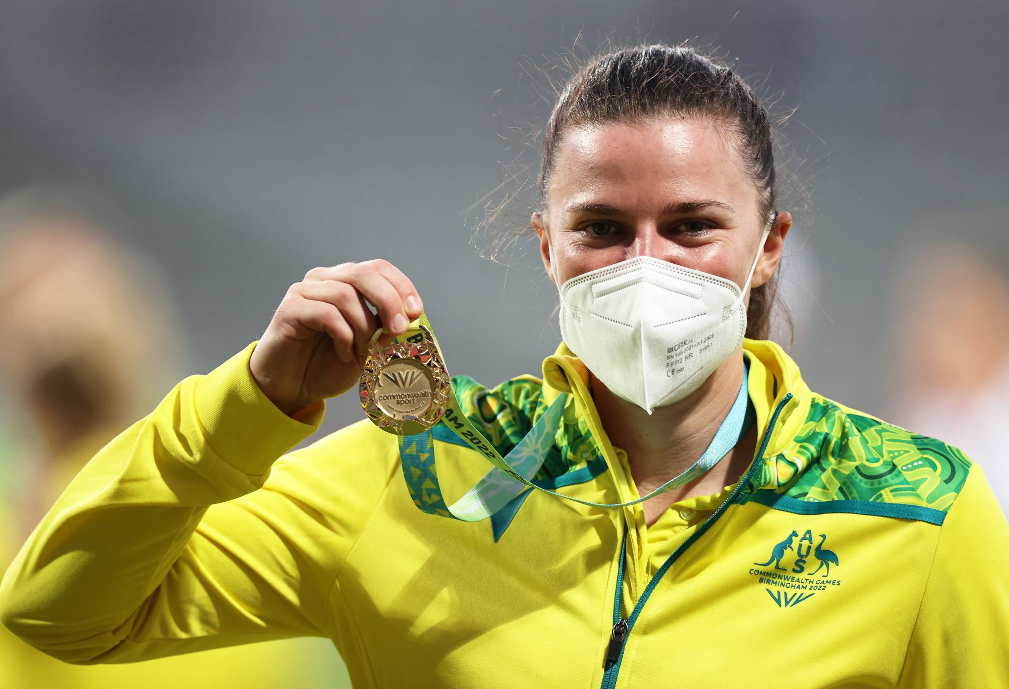 Tahlia McGrath of Team Australia poses after being presented with a Gold Medal during the Cricket T20 - Gold Medal match between Team Australia and Team India on day ten of the Birmingham 2022 Commonwealth Games at Edgbaston on August 07, 2022 on the Birmingham, England. (Photo by Ryan Pierse/Getty Images)