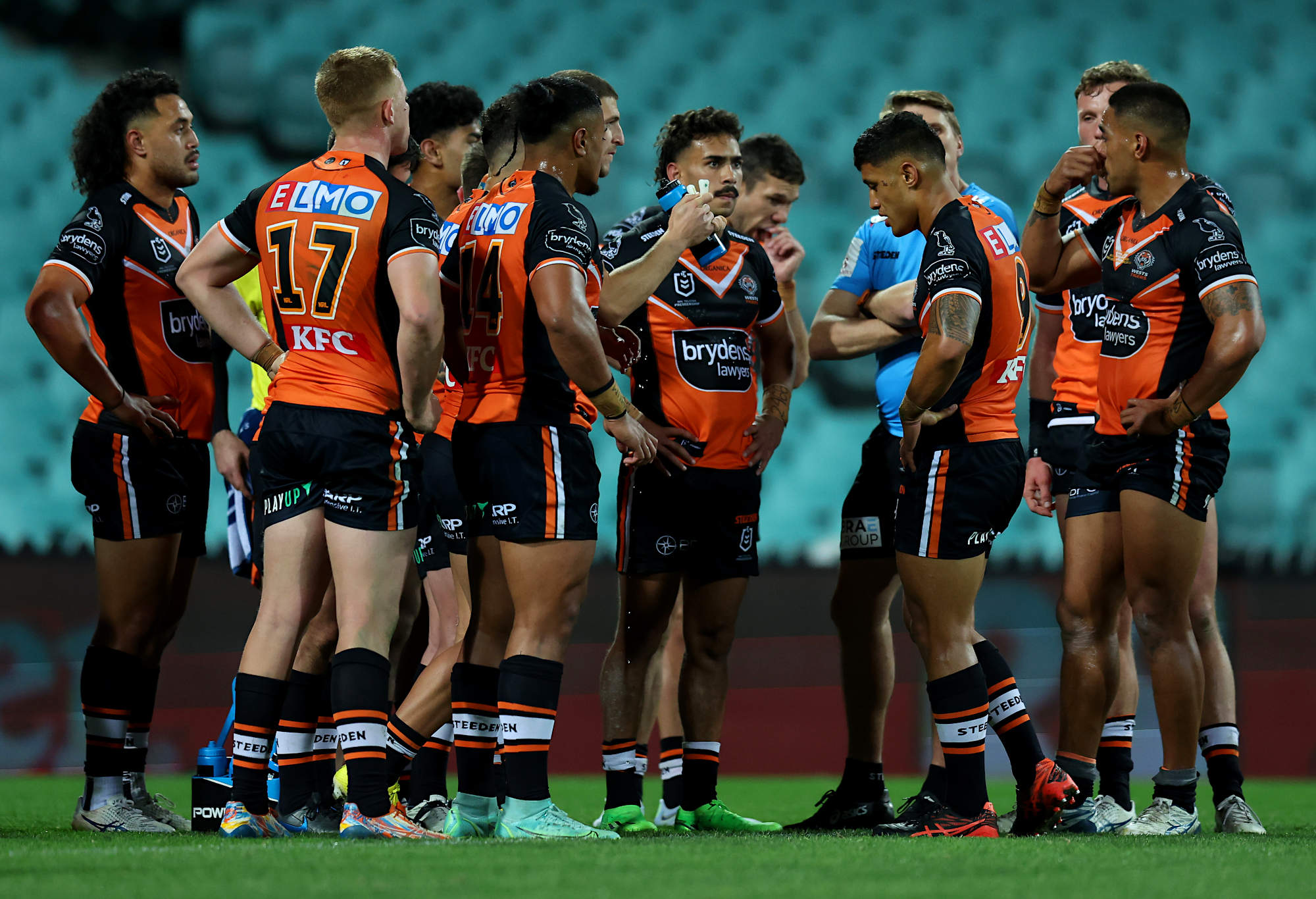 Wests Tigers players look dejected after conceding a try
