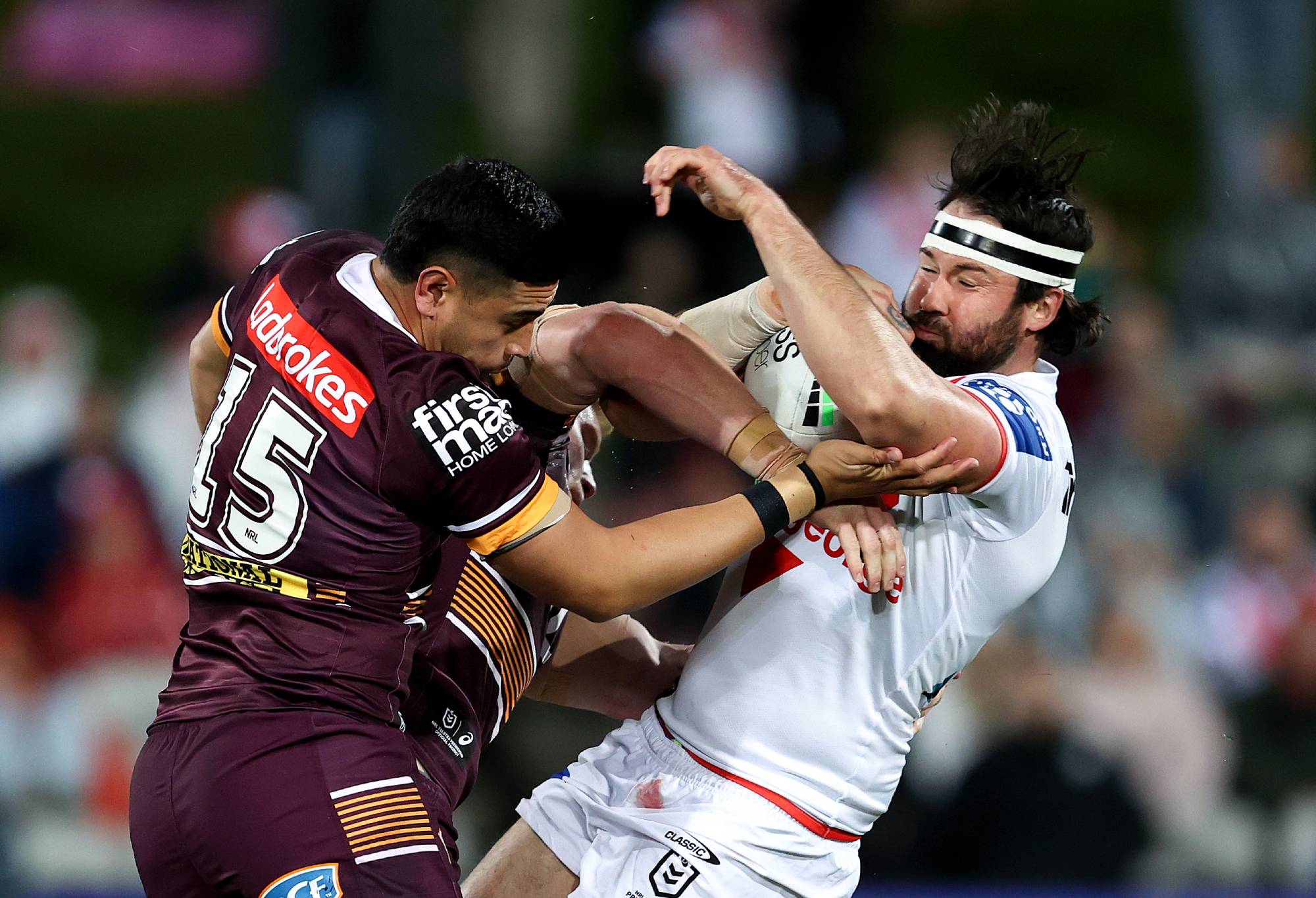 Aaron Woods of the Dragons is tackled by the Broncos defence during the round 25 NRL match between the St George Illawarra Dragons and the Brisbane Broncos at Netstrata Jubilee Stadium, on September 03, 2022, in Sydney, Australia. (Photo by Brendon Thorne/Getty Images)