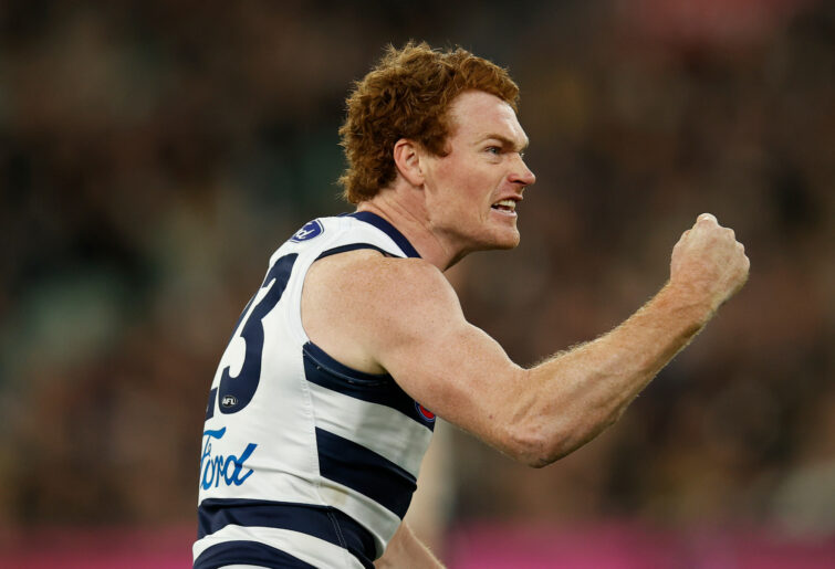 Gary Rohan of the Cats celebrates a goal.