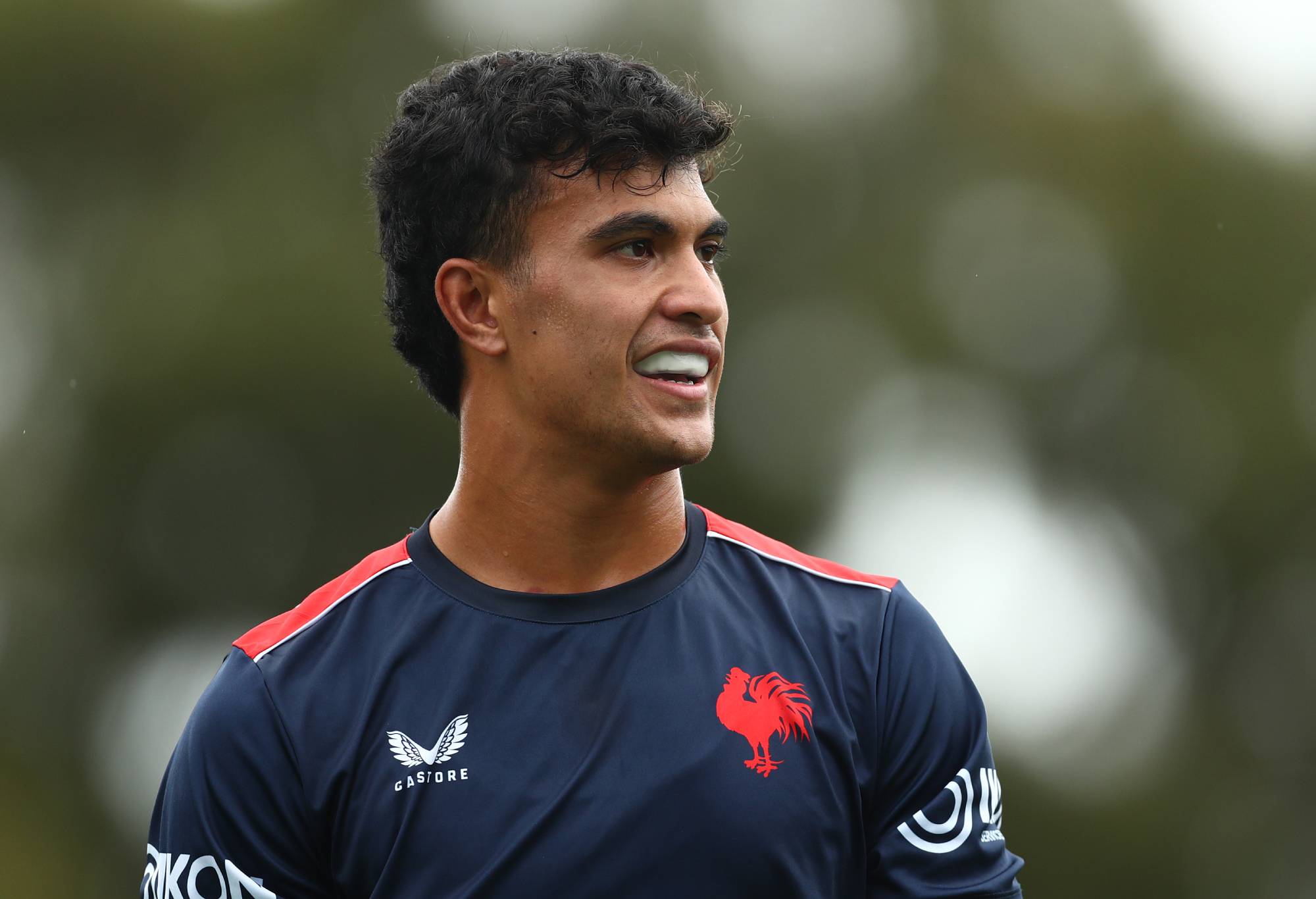 SYDNEY, AUSTRALIA - MARCH 29: Joseph Suaalii smiles during a Sydney Roosters NRL training session at Kippax Lake on March 29, 2022 in Sydney, Australia. (Photo by Mark Metcalfe/Getty Images)