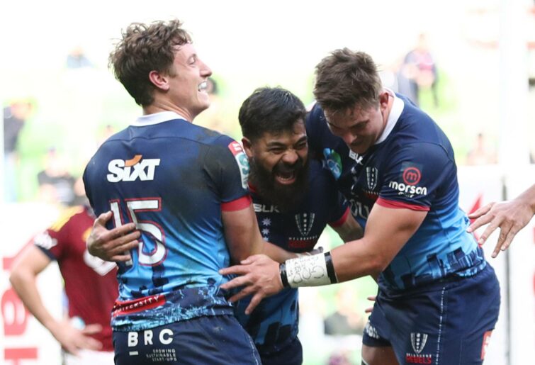 Young Tonumaipea (C) of the Rebels celebrates with teammates after scoring a try during the round 15 Super Rugby Pacific match between the Melbourne Rebels and the Highlanders at AAMI Park on May 29, 2022 in Melbourne, Australia. (Photo by Mike Owen/Getty Images)